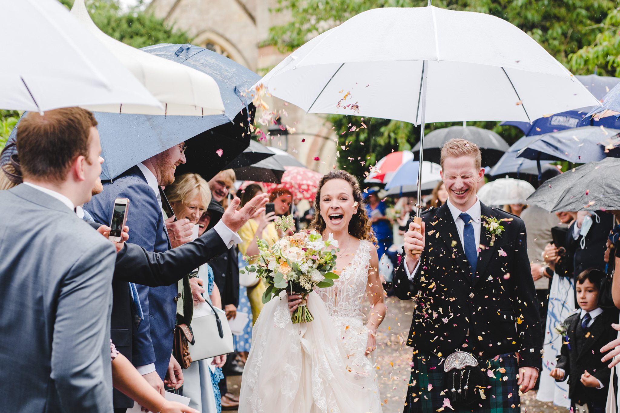 Happy confetti faces outside Tetbury church