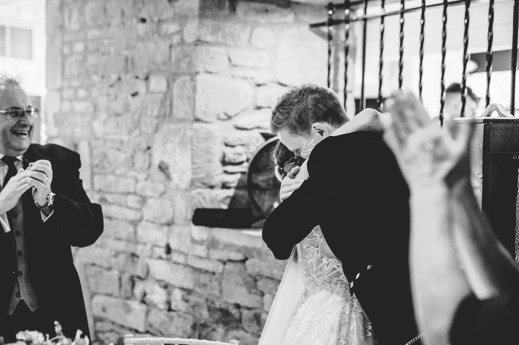 Bride hugging her groom