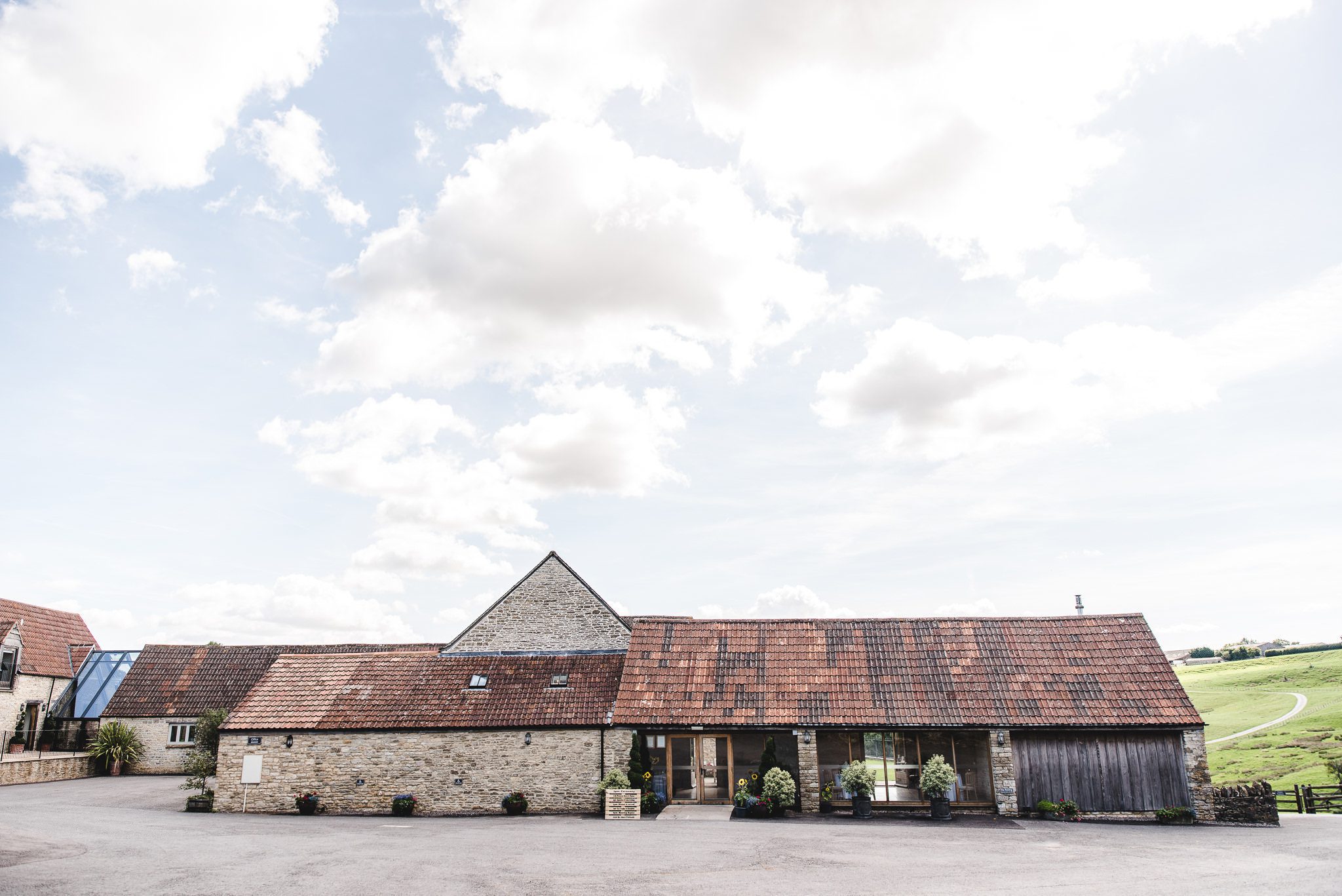 Front wide view of Kingscote barn wedding venue