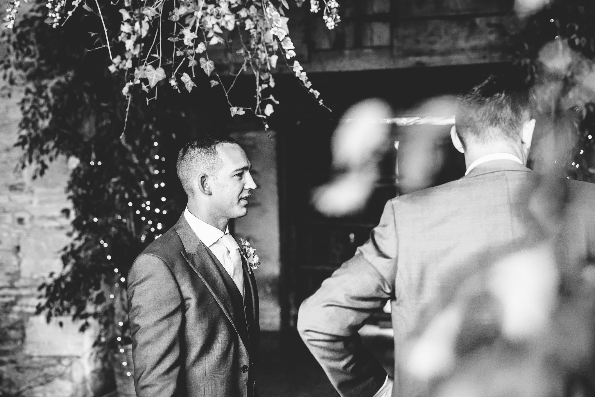 Groom waiting for his bride at Stone Barn