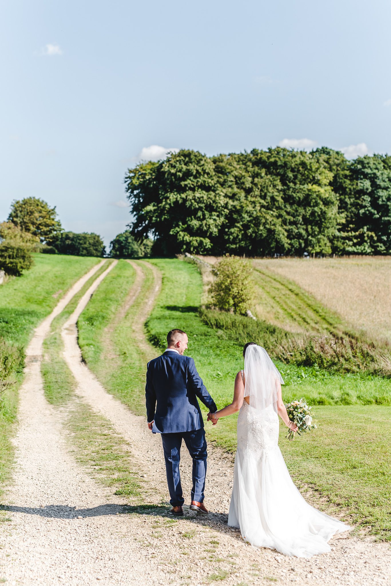 Couple portraits at Stone Barn Wedding Venue in the Cotswolds