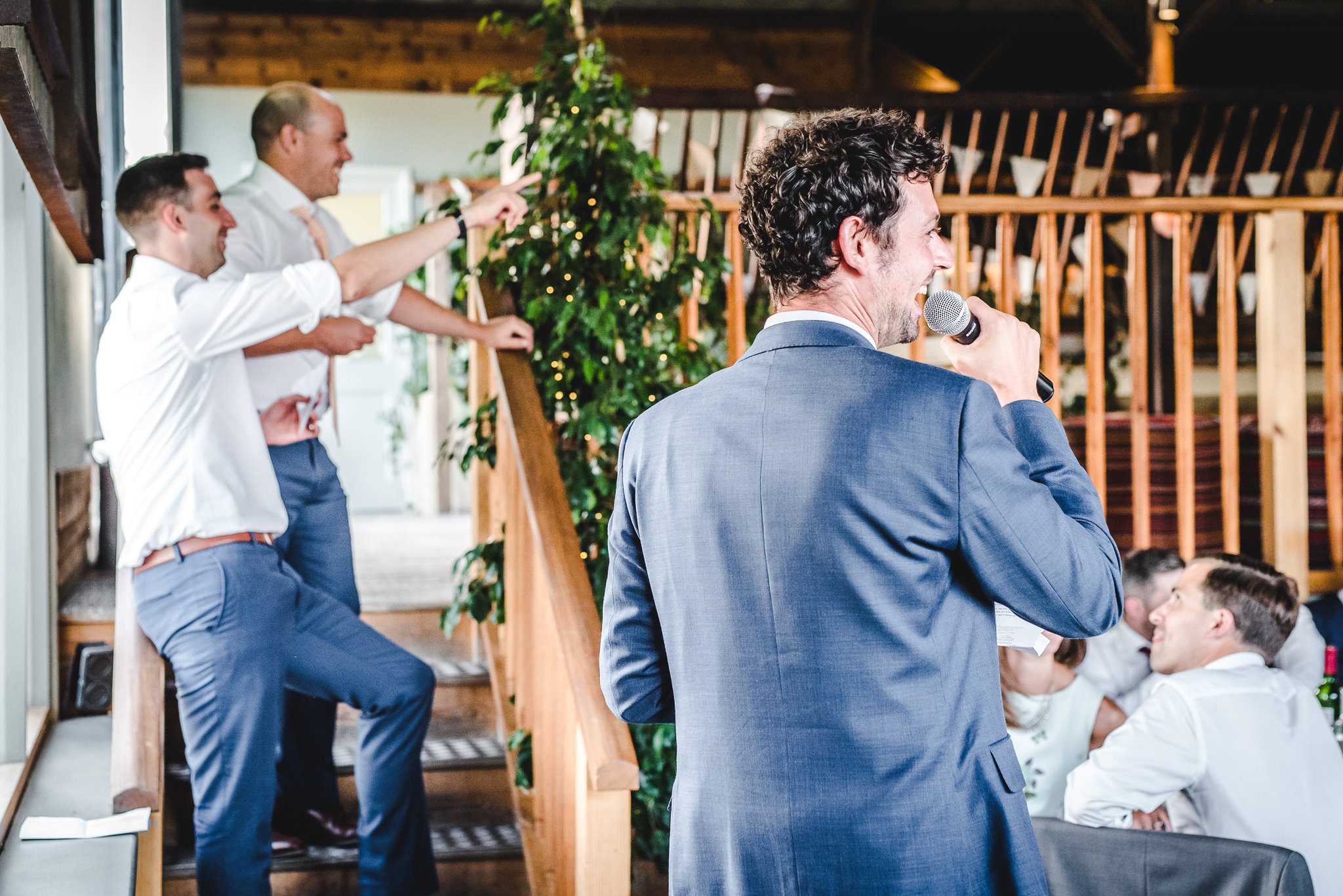 Stone Barn wedding best man speech holding microphone