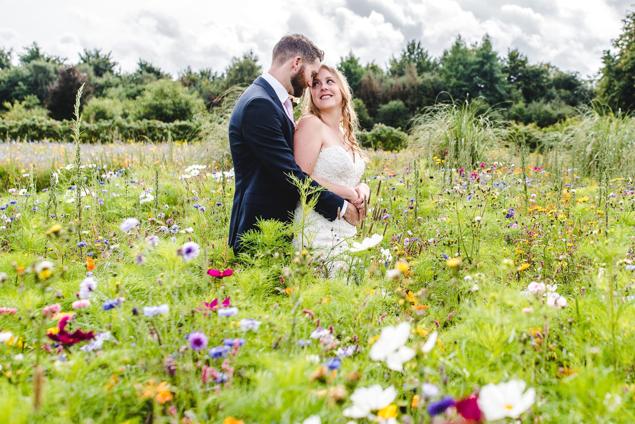 Bride and Groom in a colourful flower garden at Matara