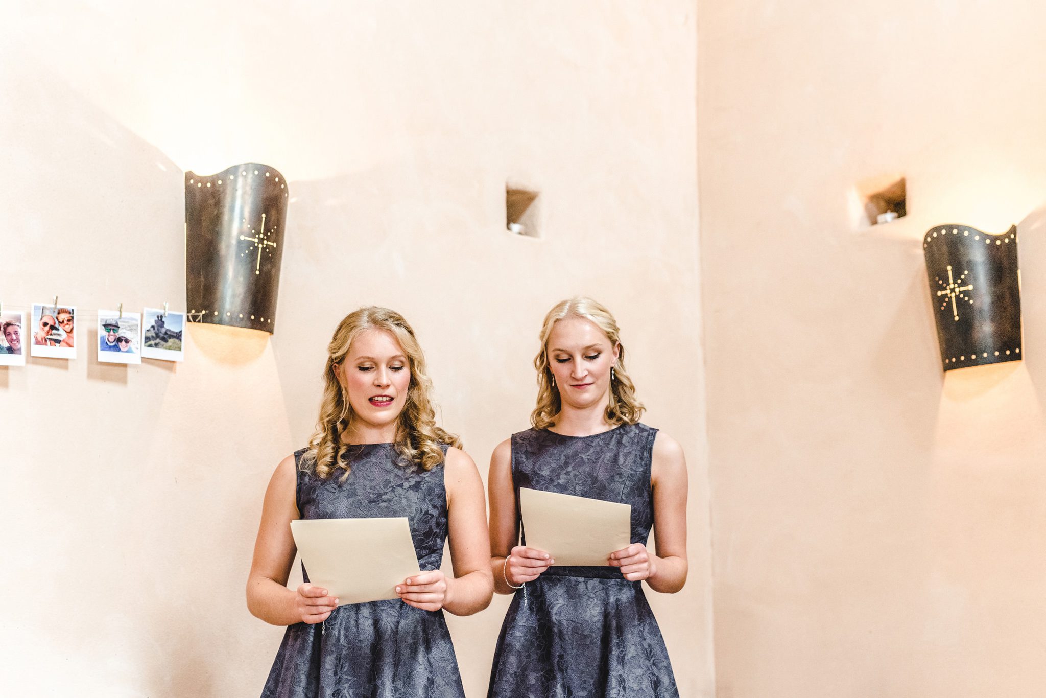Bride's sisters reading at an Oxleaze Wedding