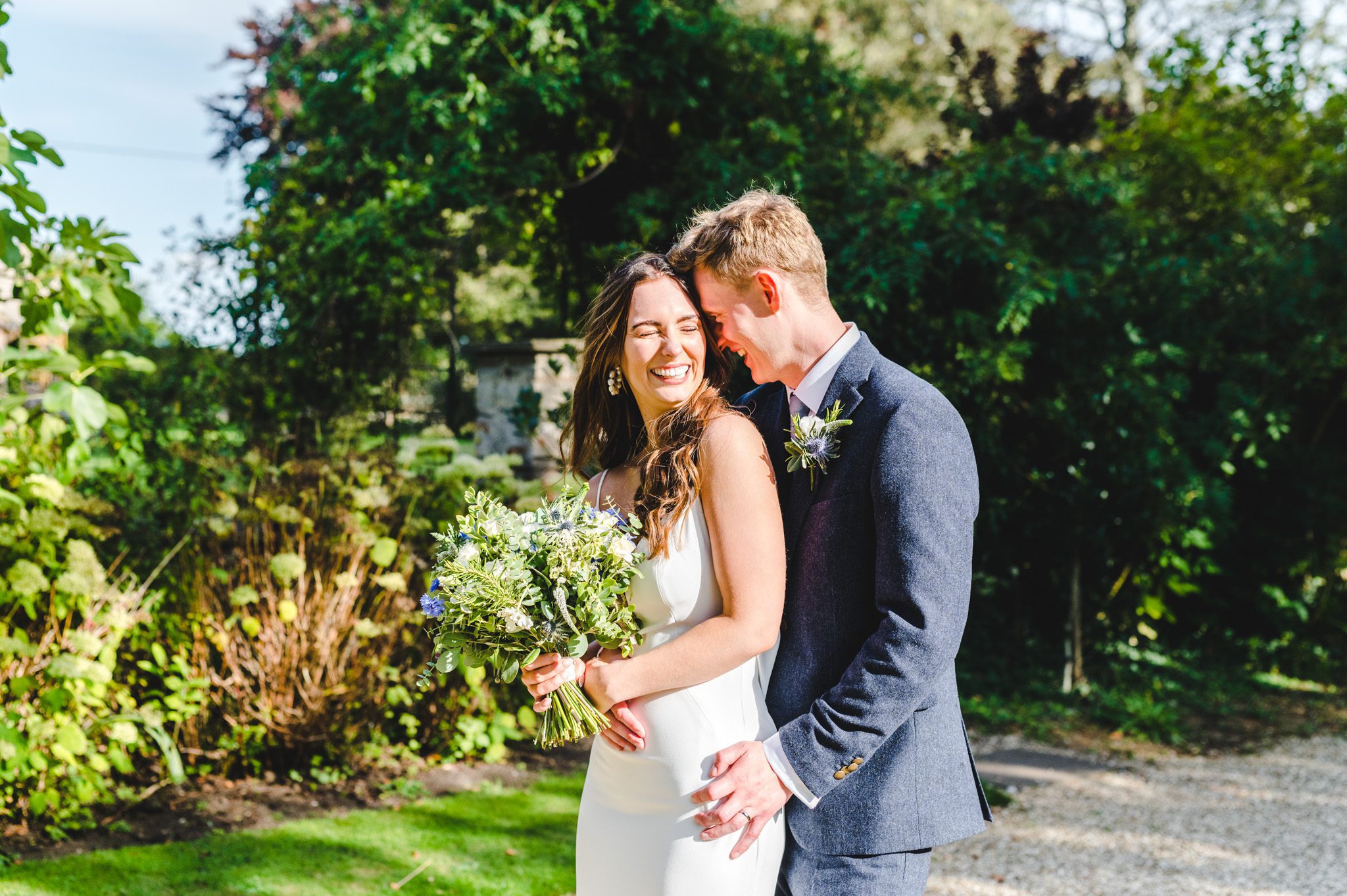 Bride and groom hugging