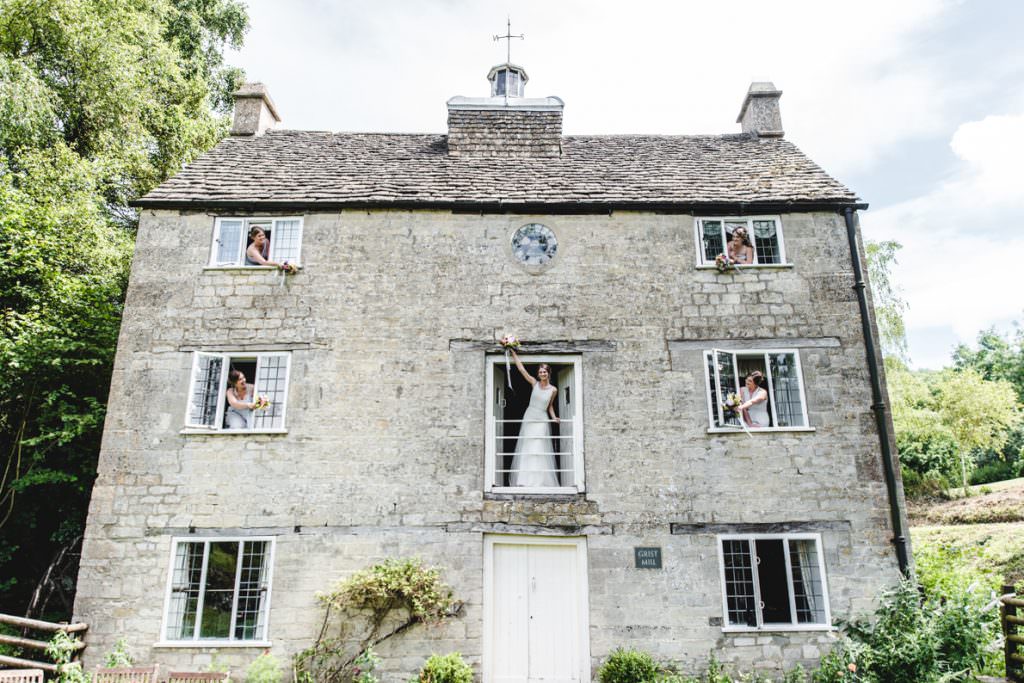 A bride and her bridesmaids at Grist Mill in the Cotswolds