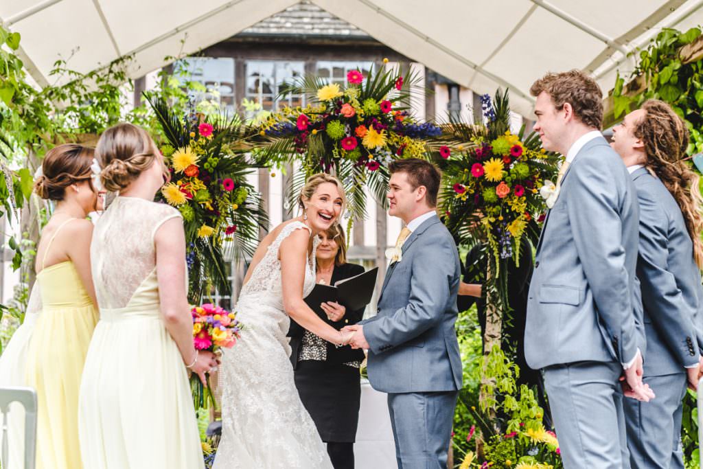 Bride and Groom getting married outdoors at Brinsop Court