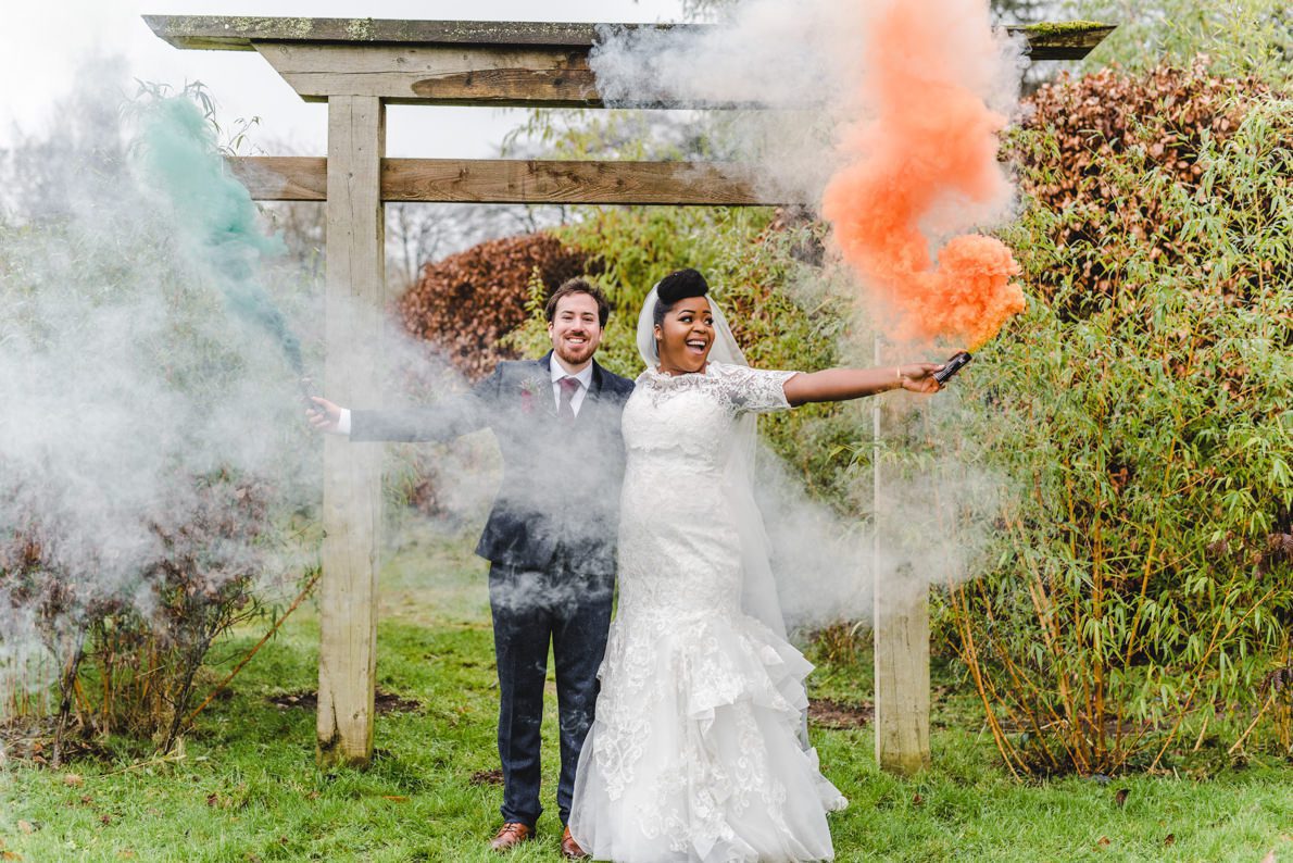 Smokebombs with bride and groom
