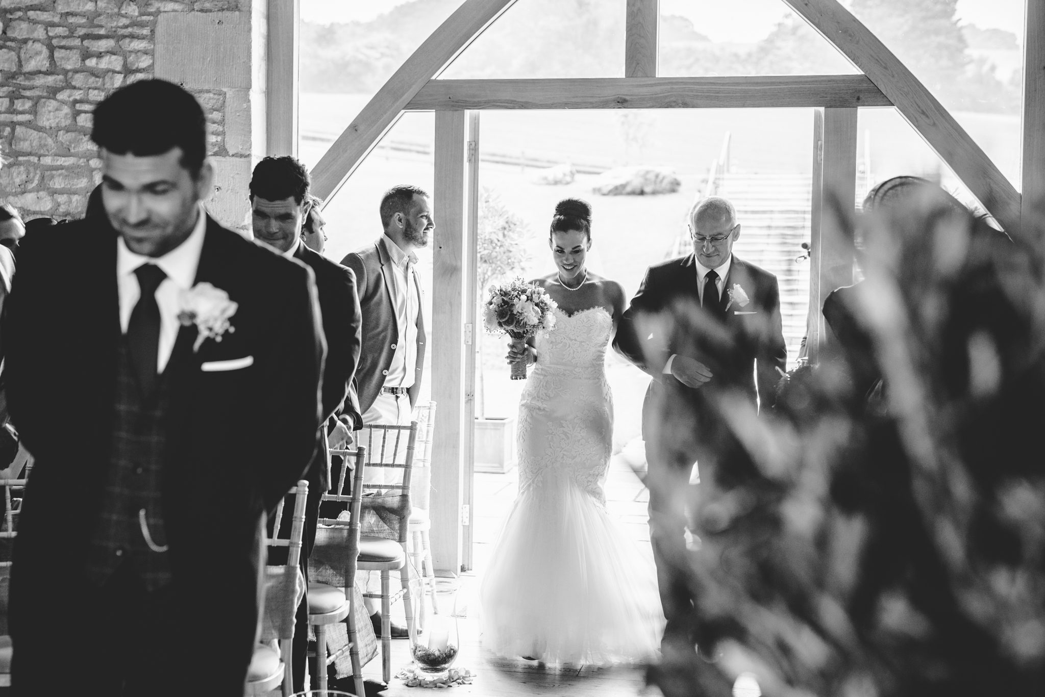 bride walking down aisle to meet groom