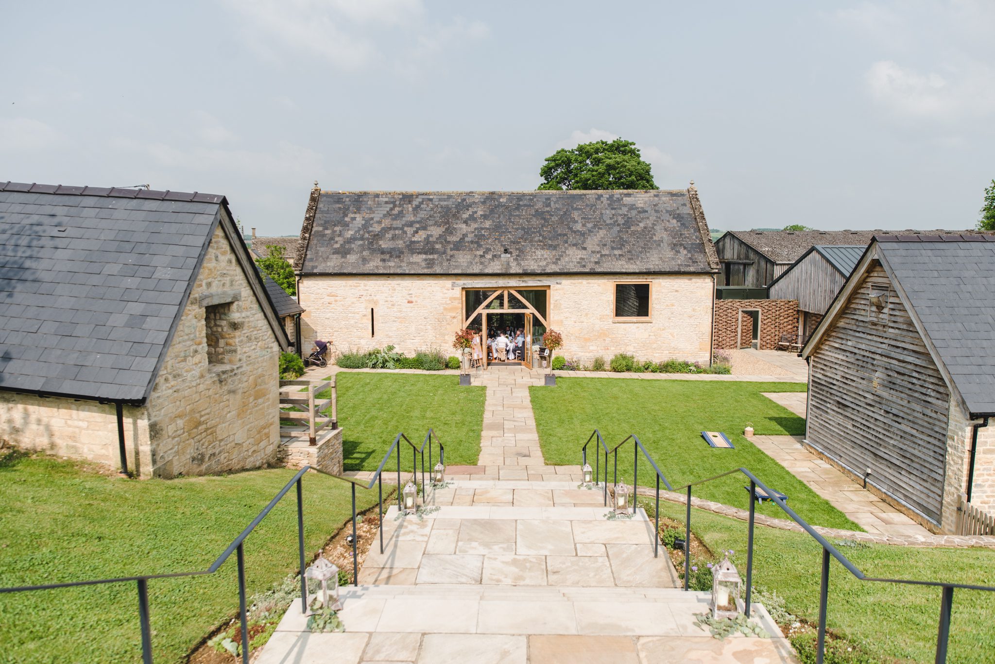 Wide view of the barn at upcote gloucestershire wedding venue