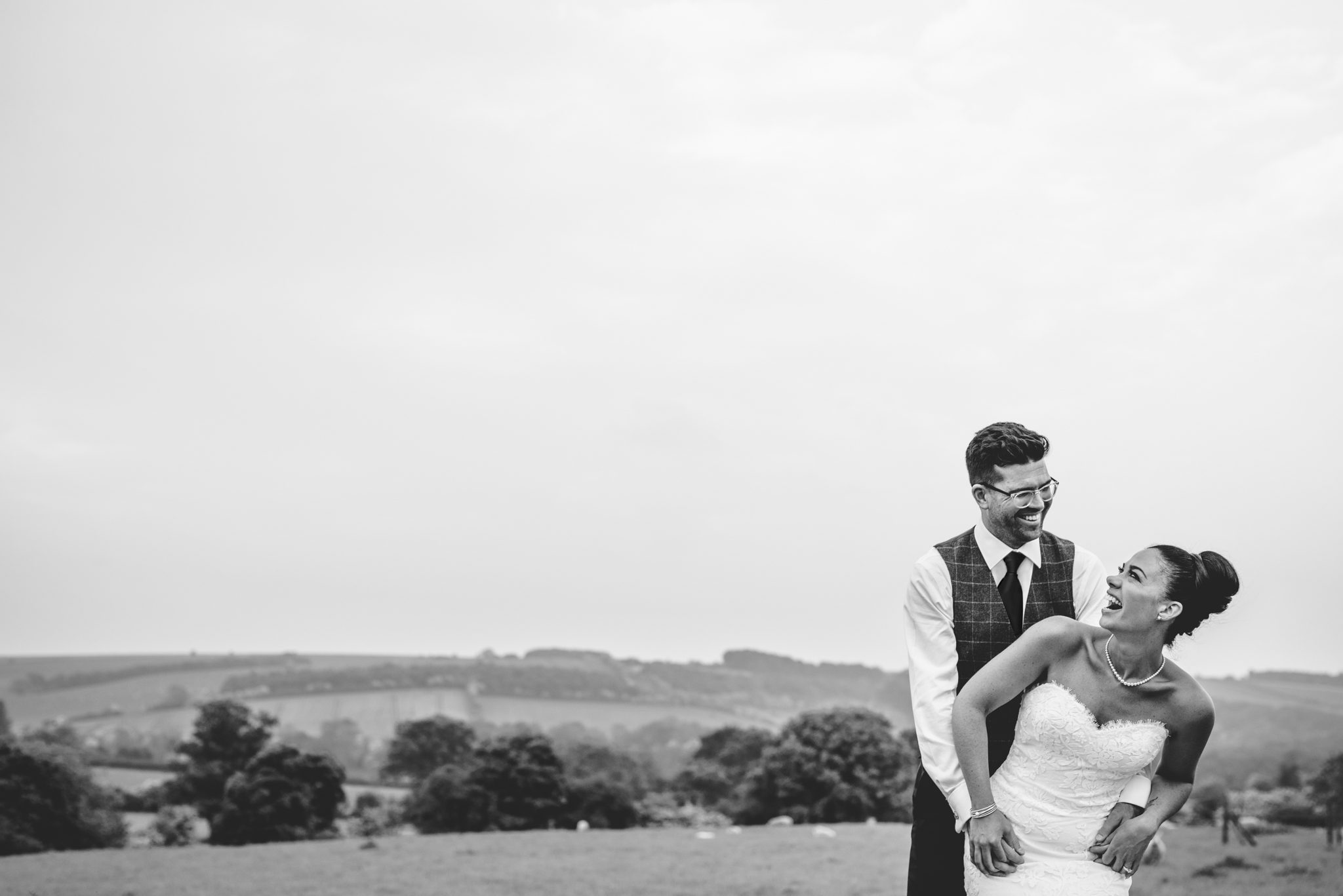 Black and white bride and groom portraits at upcote barn