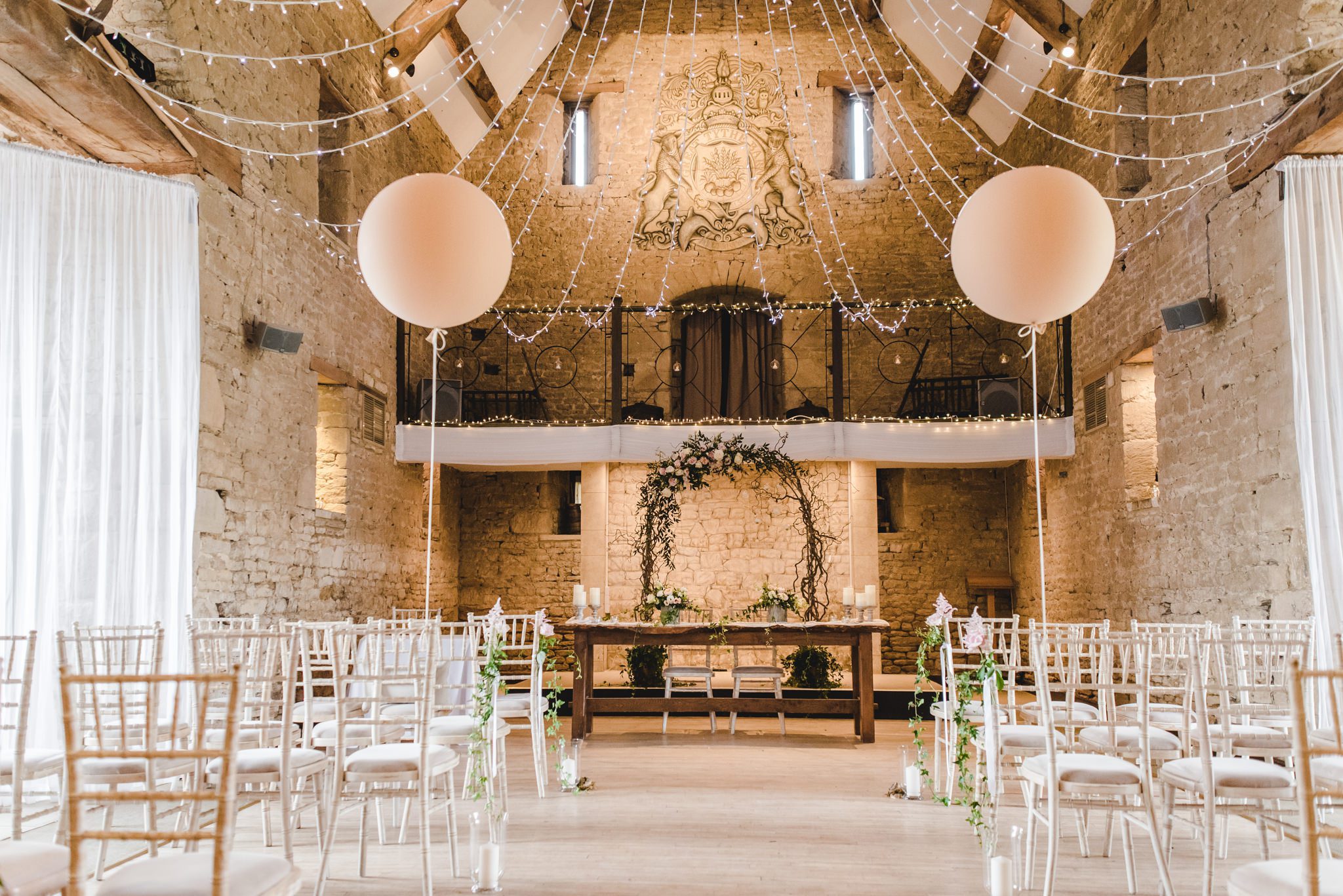 Ceremony room set up for a wedding at the great tythe barn