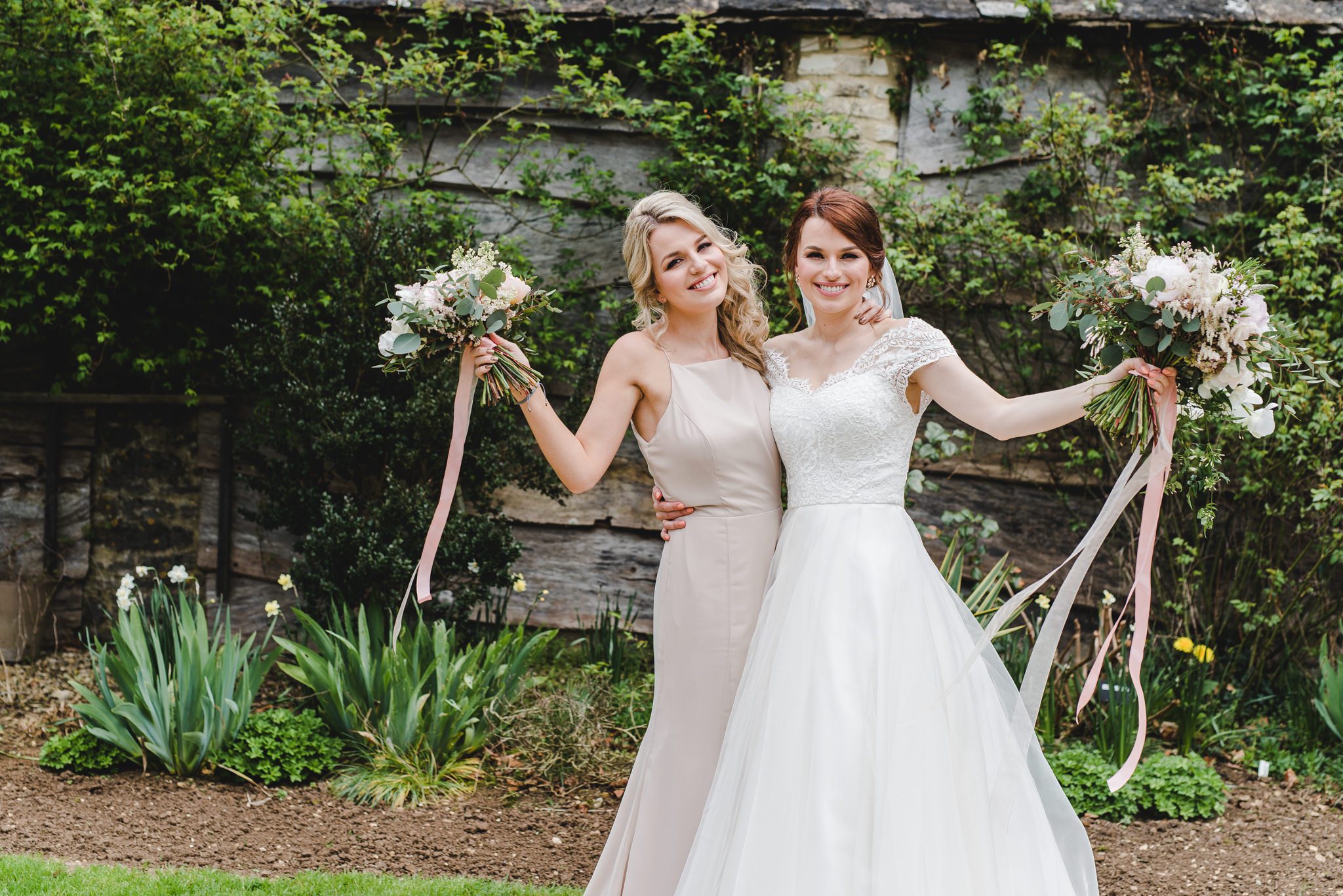 Bride and her twin sister at the great tythe barn