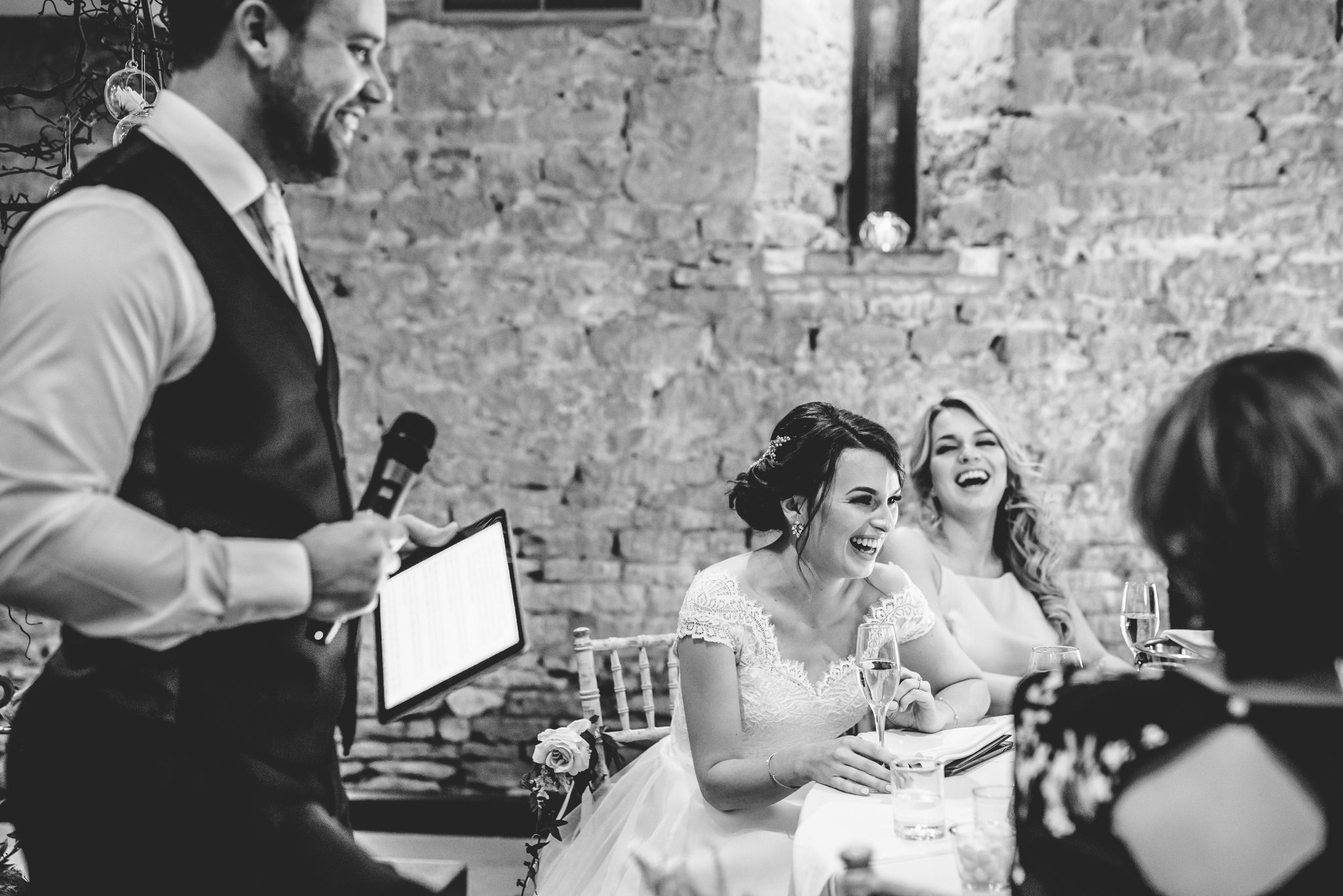 Laughing during the speeches at the great tythe barn