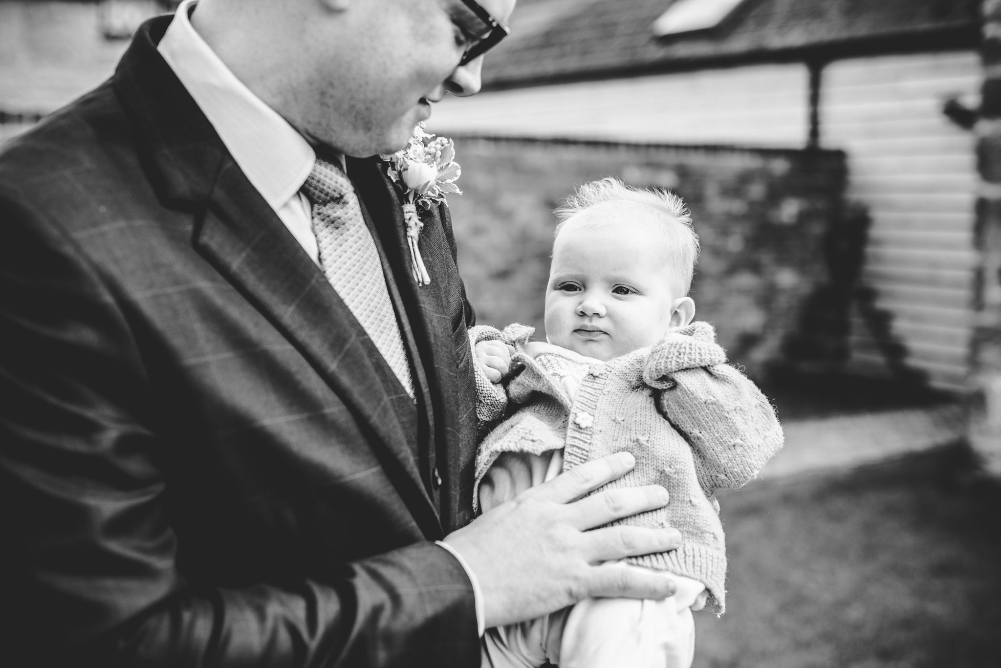 Baby being held by father at blackwell grange