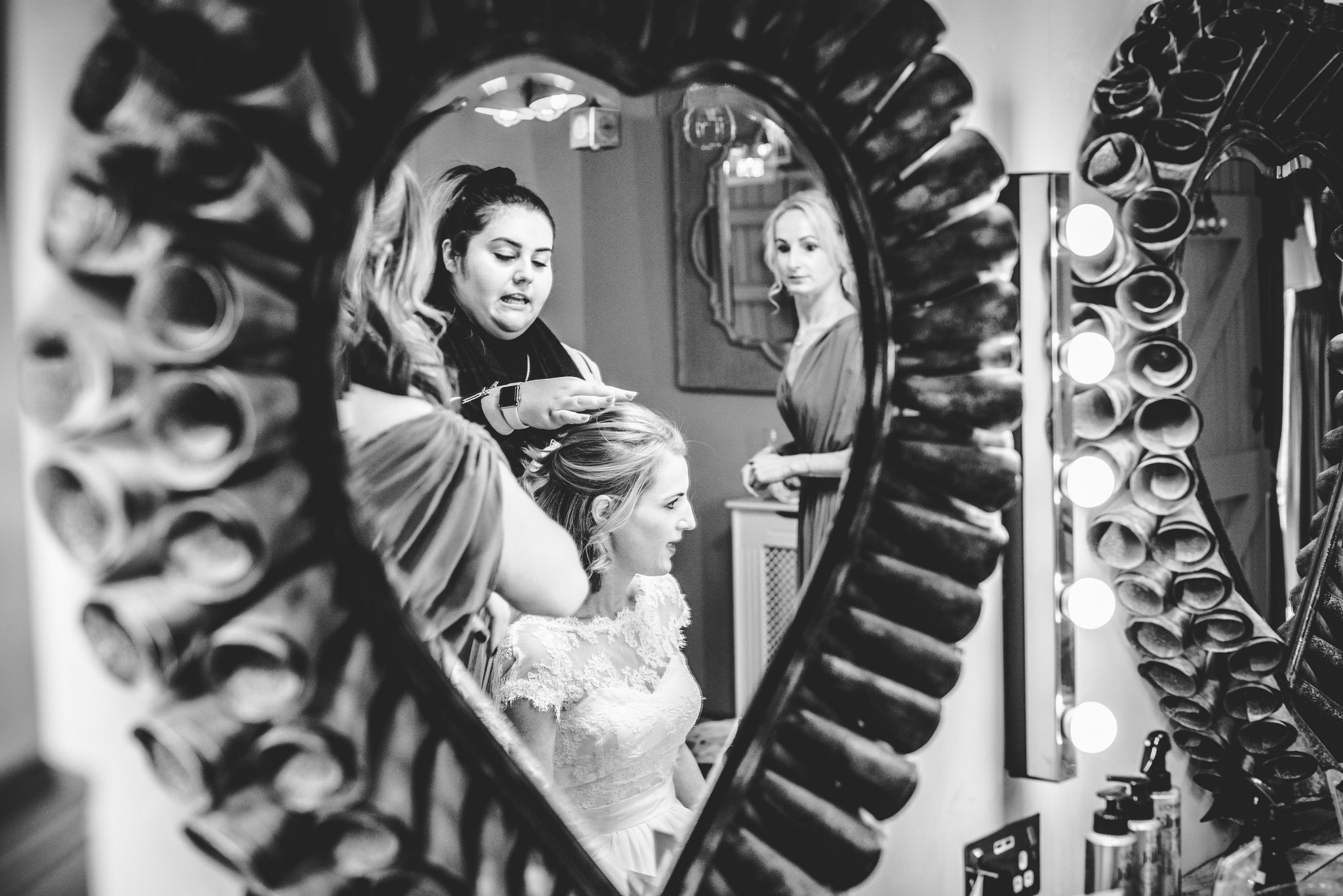 Bride having her hair styled