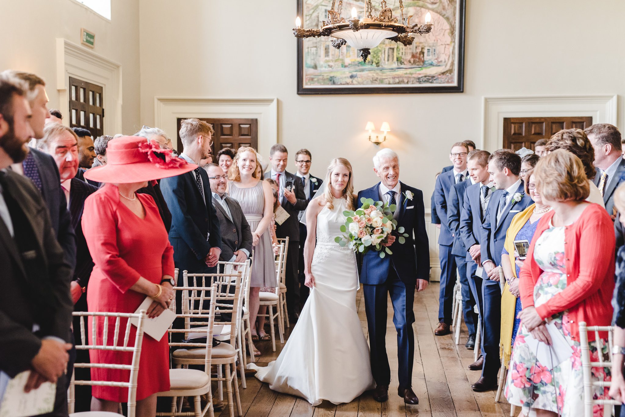 Bride walking down the aisle at Elmore Court