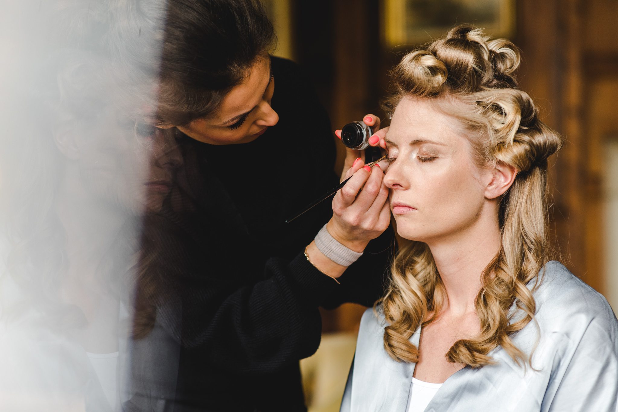 Harriet Cook Make Up Artist doing Louise's make-up at her Elmore Court wedding