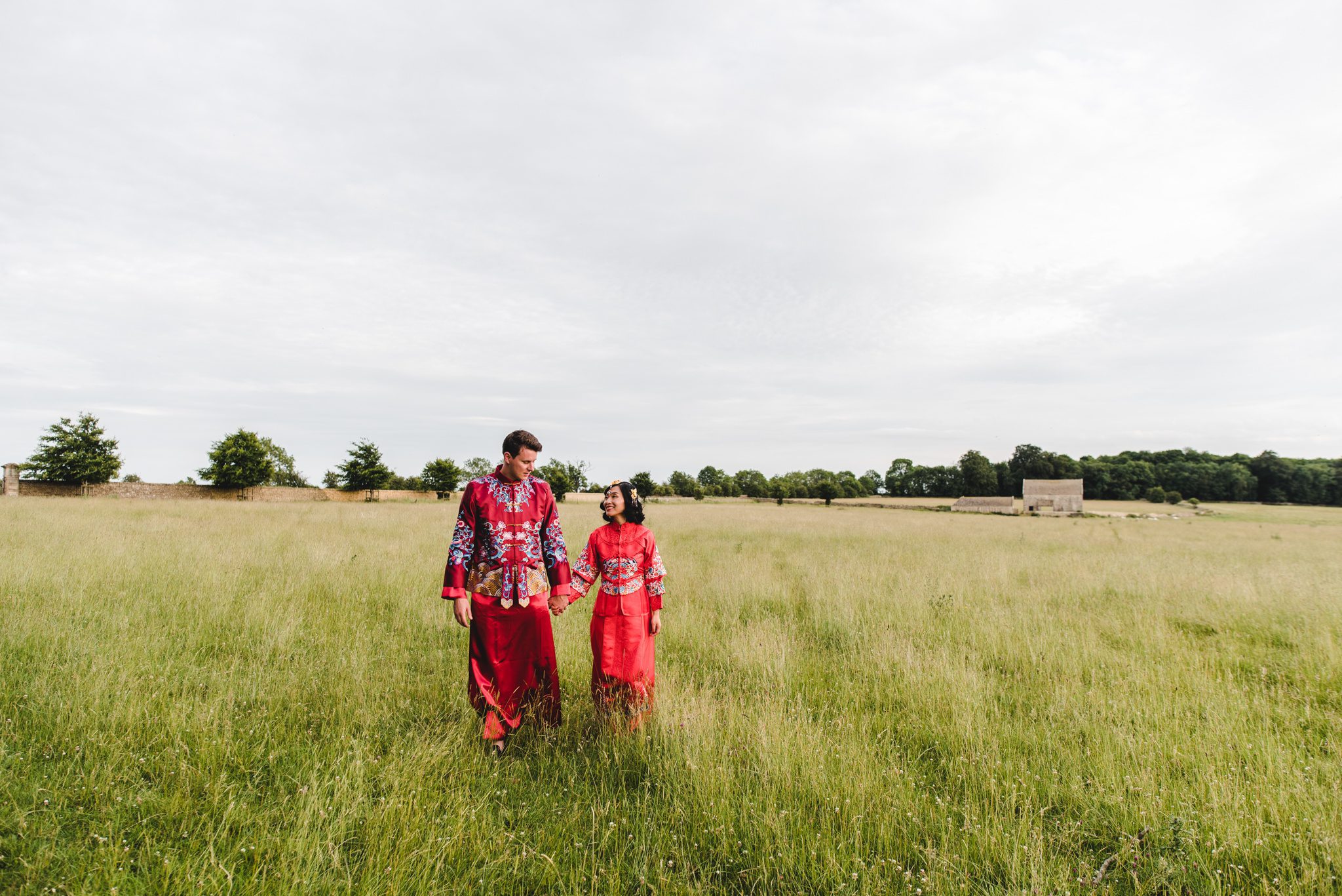 Bride and Groom in tradional chinese dress at a Gloucestershire wedding