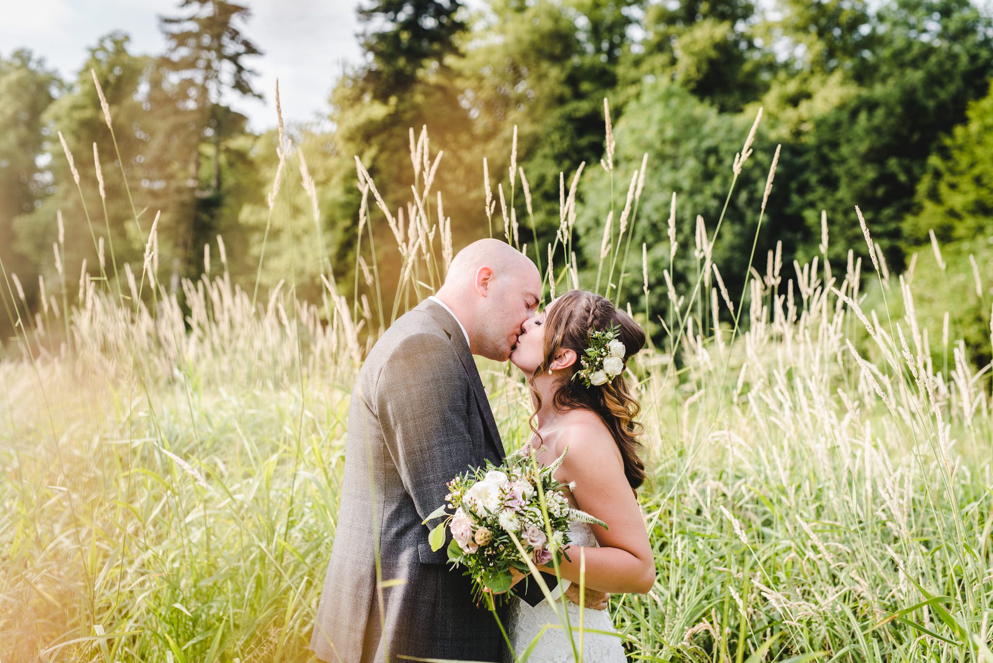 Wedding couple in long grasses