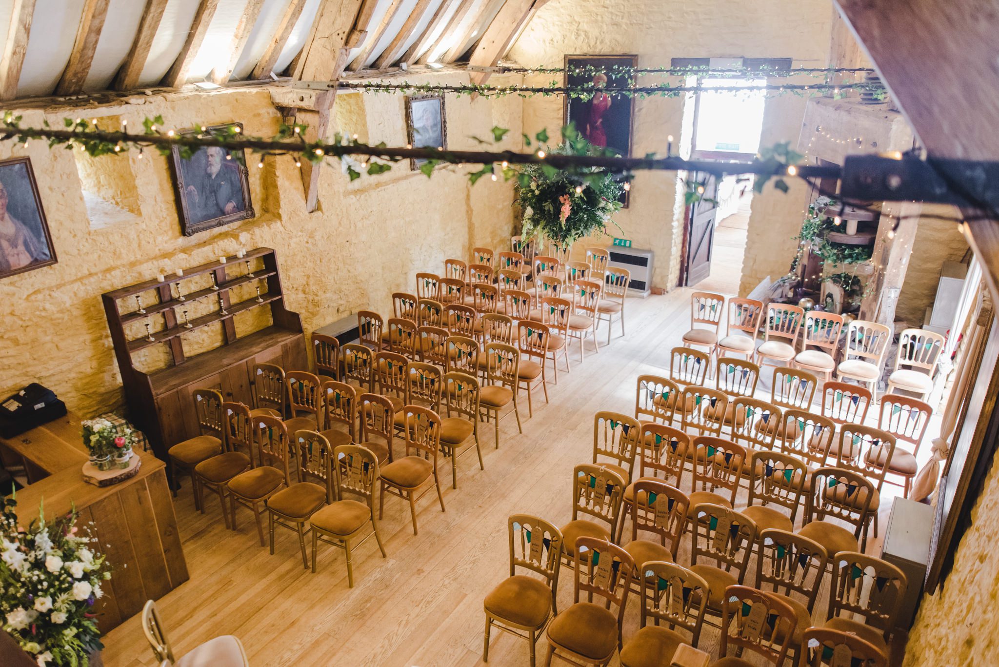 The Cyder Barn at Owlpen Manor set up for a wedding