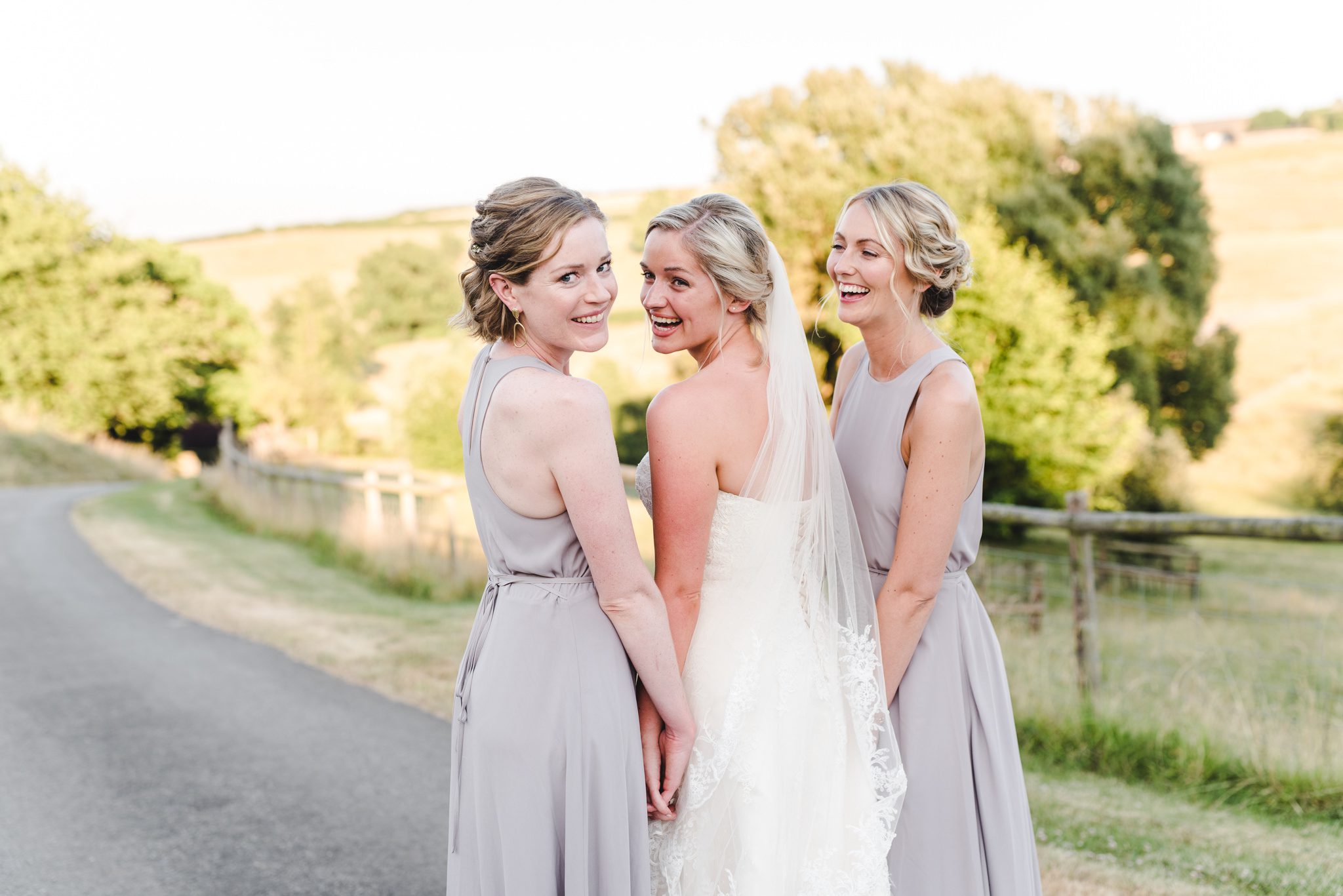A bride and her girlfriends at Kingscote Barn
