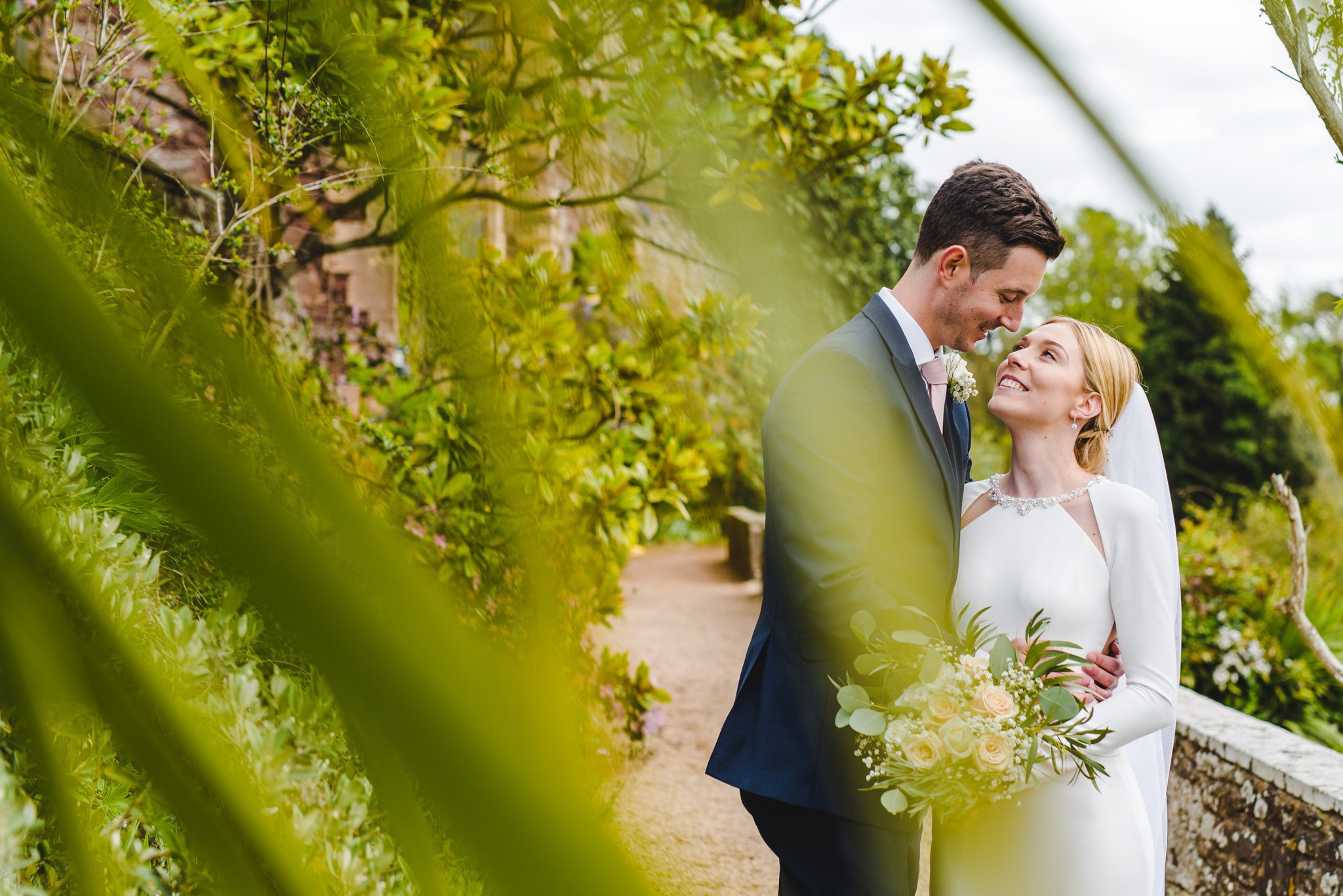 Berkeley castle couple wedding portriats in the gardens