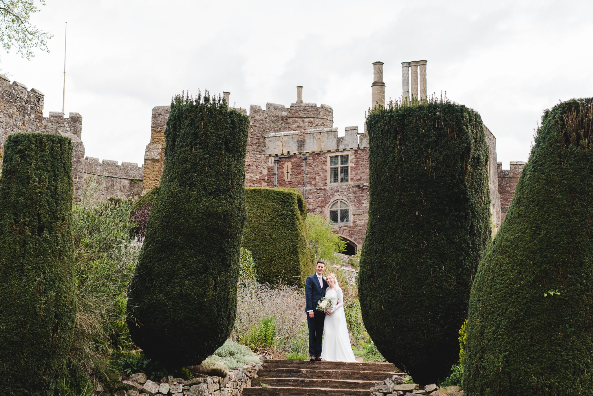 Berkeley castle couple wedding portriats in the gardens