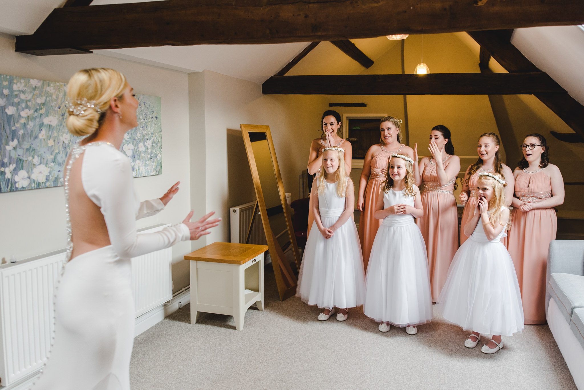 A first look with a bride and her bridesmaids