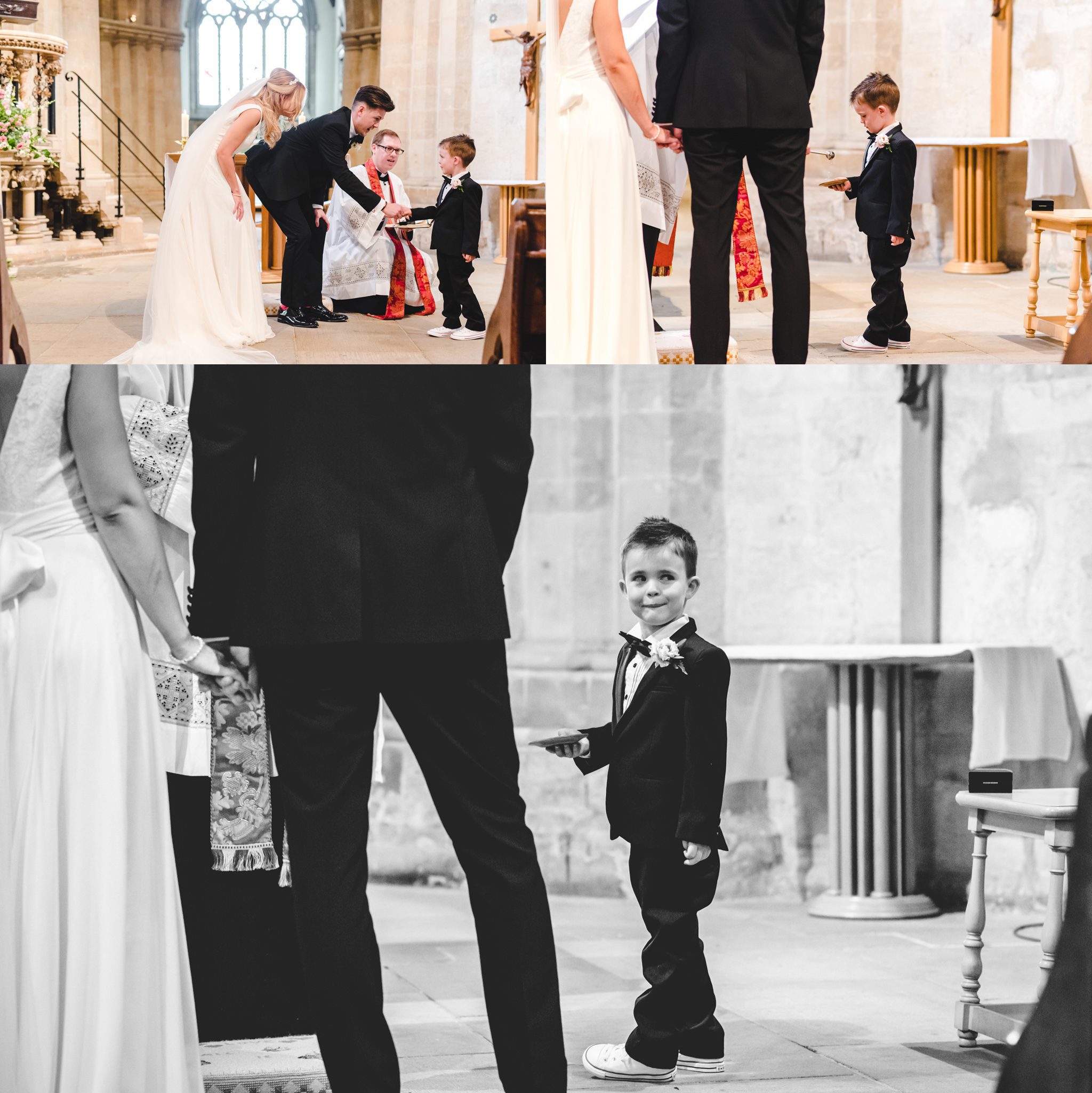 A little boy handing over the wedding rings in church