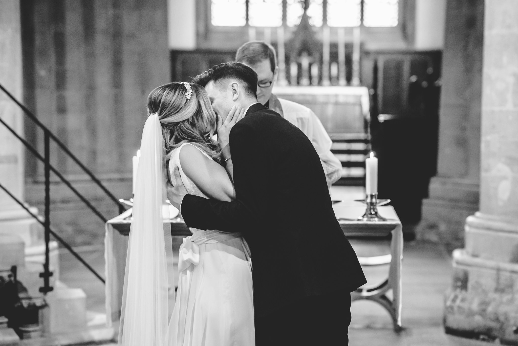 Firs kiss at a church wedding
