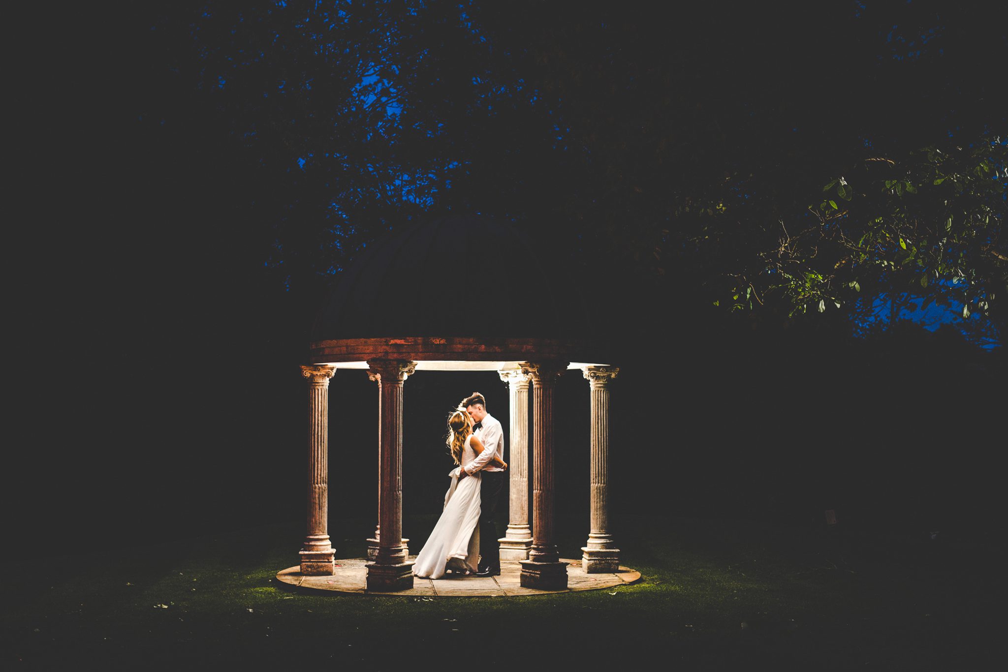 An after dark flash picture of a couple at Ardington House