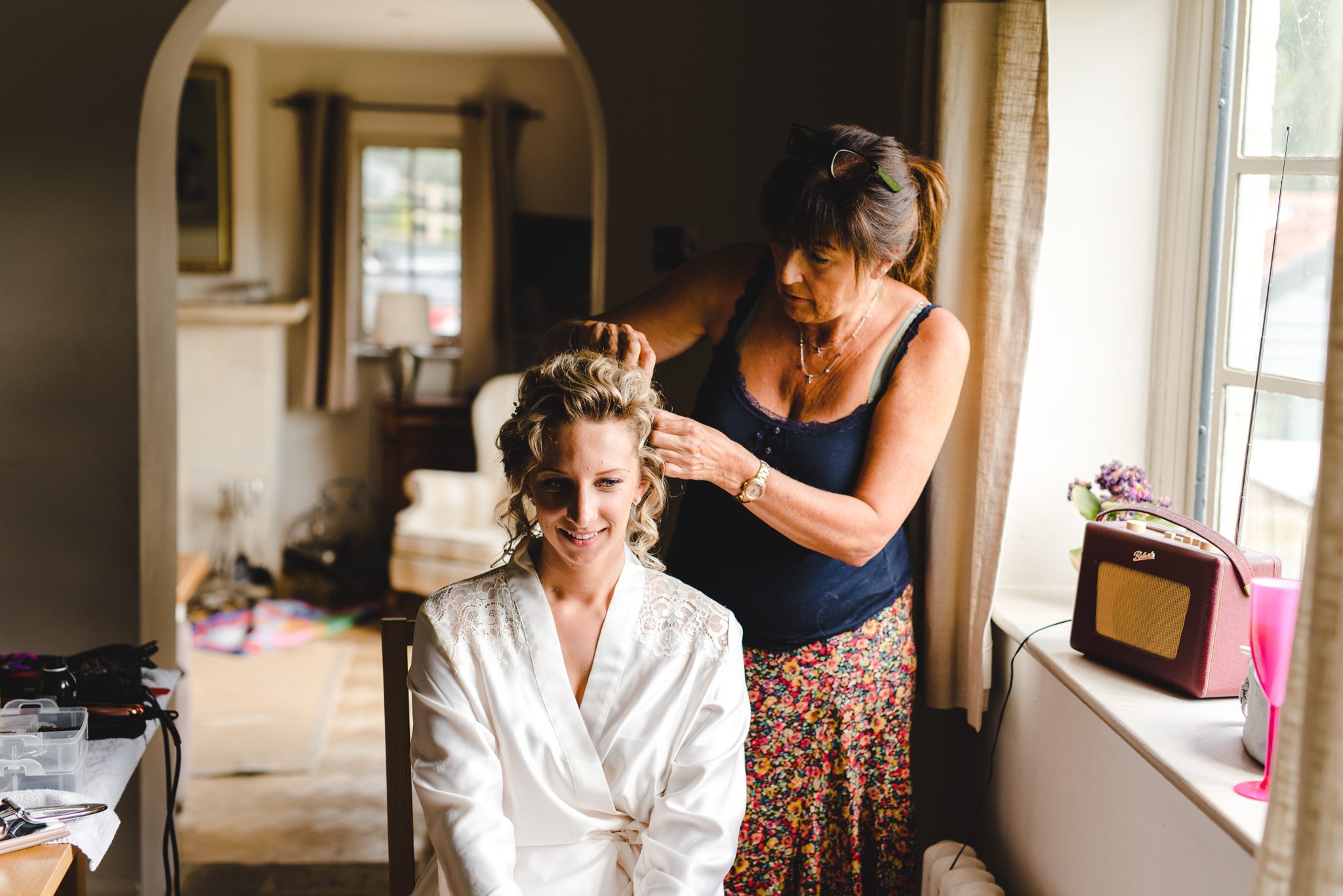 Hair being styled for a wedding