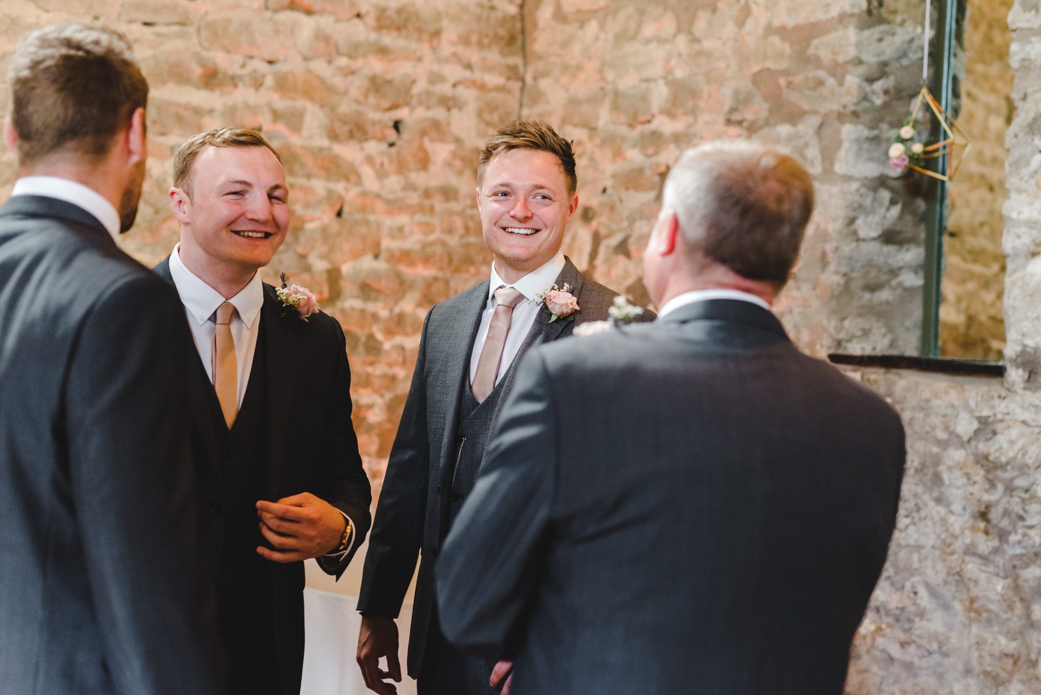 A groom waiting for hi sbride at Priston Mill in the Cotswolds