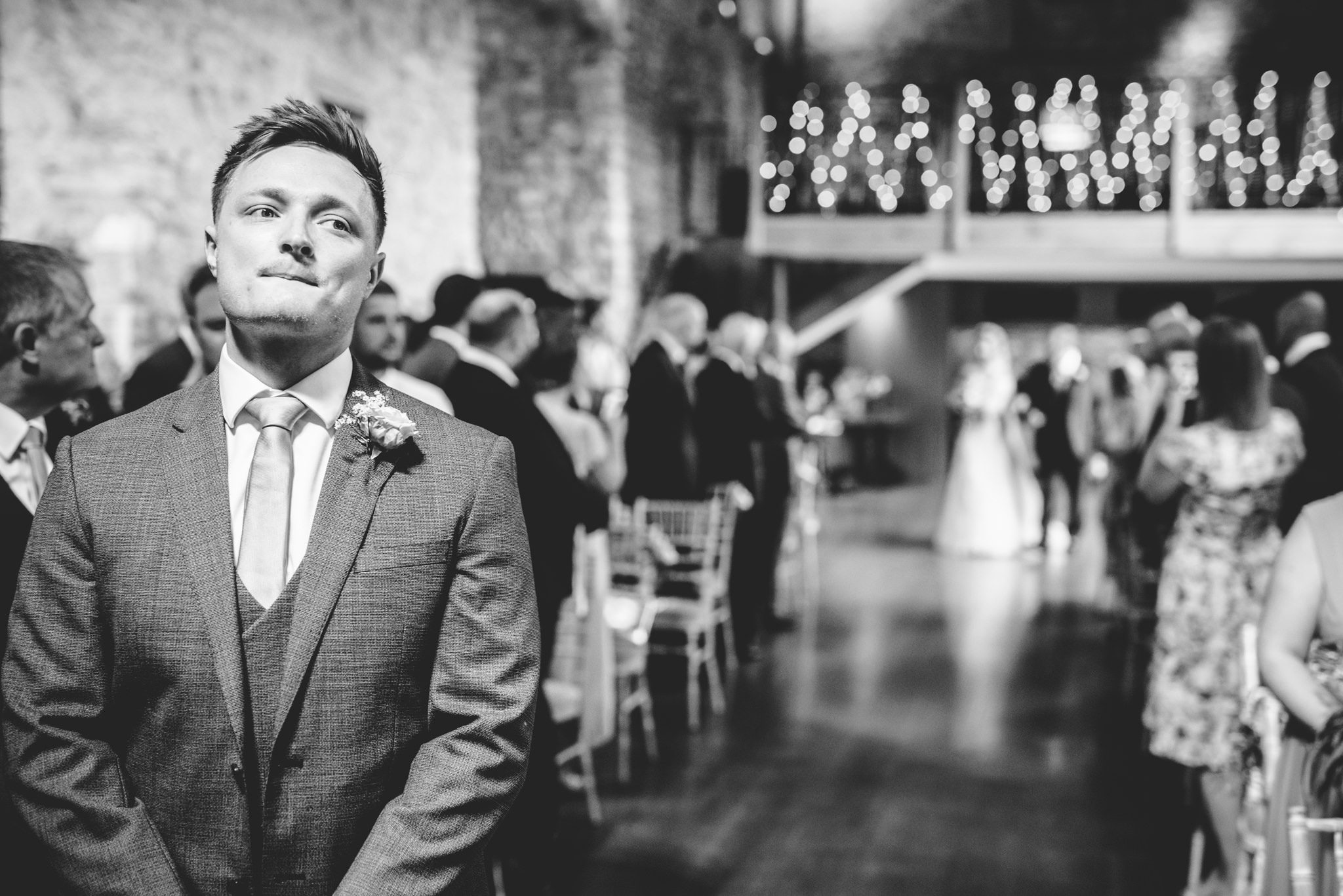 Groom waiting for the bride at Priston Mill