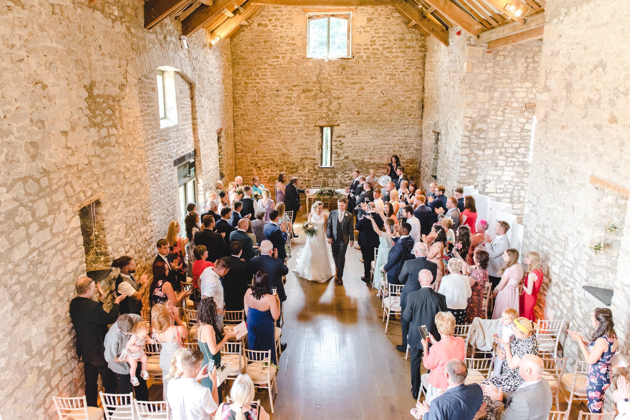 Bride and grrom ceremony exit at Priston Mill