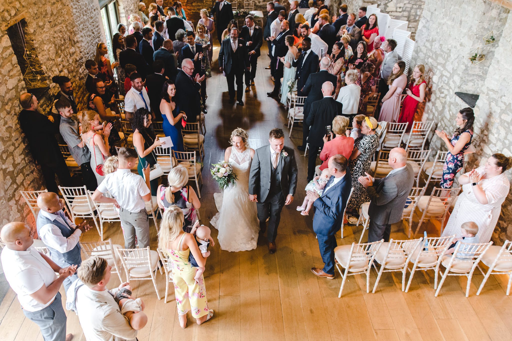 Bride and grrom ceremony exit at Priston Mill