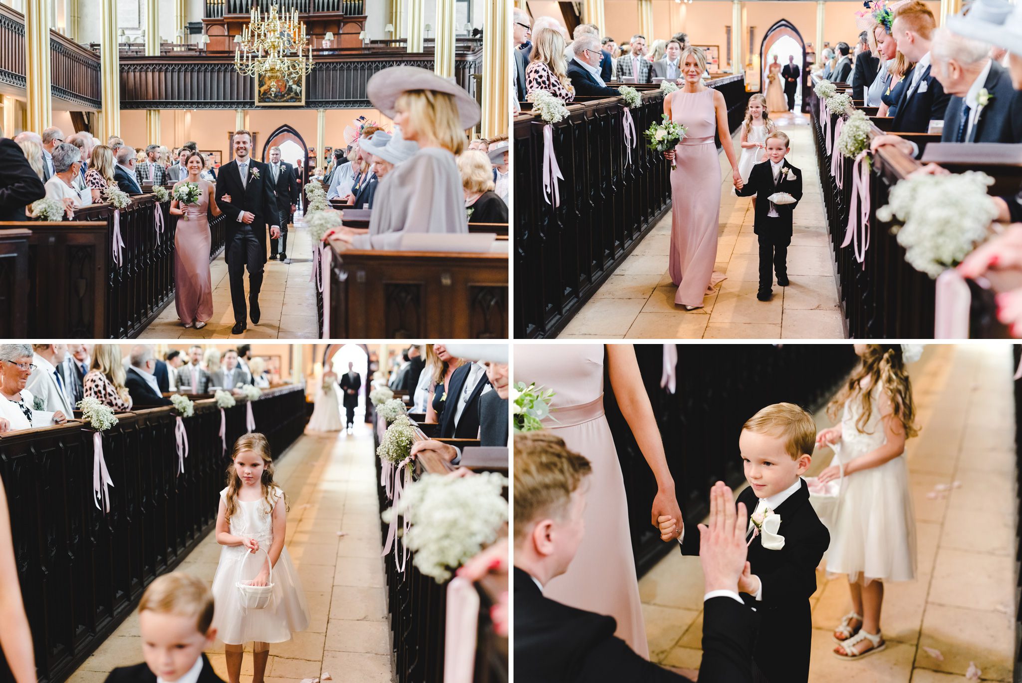 Bridesmaids and flower girl in aisle in Tetbury