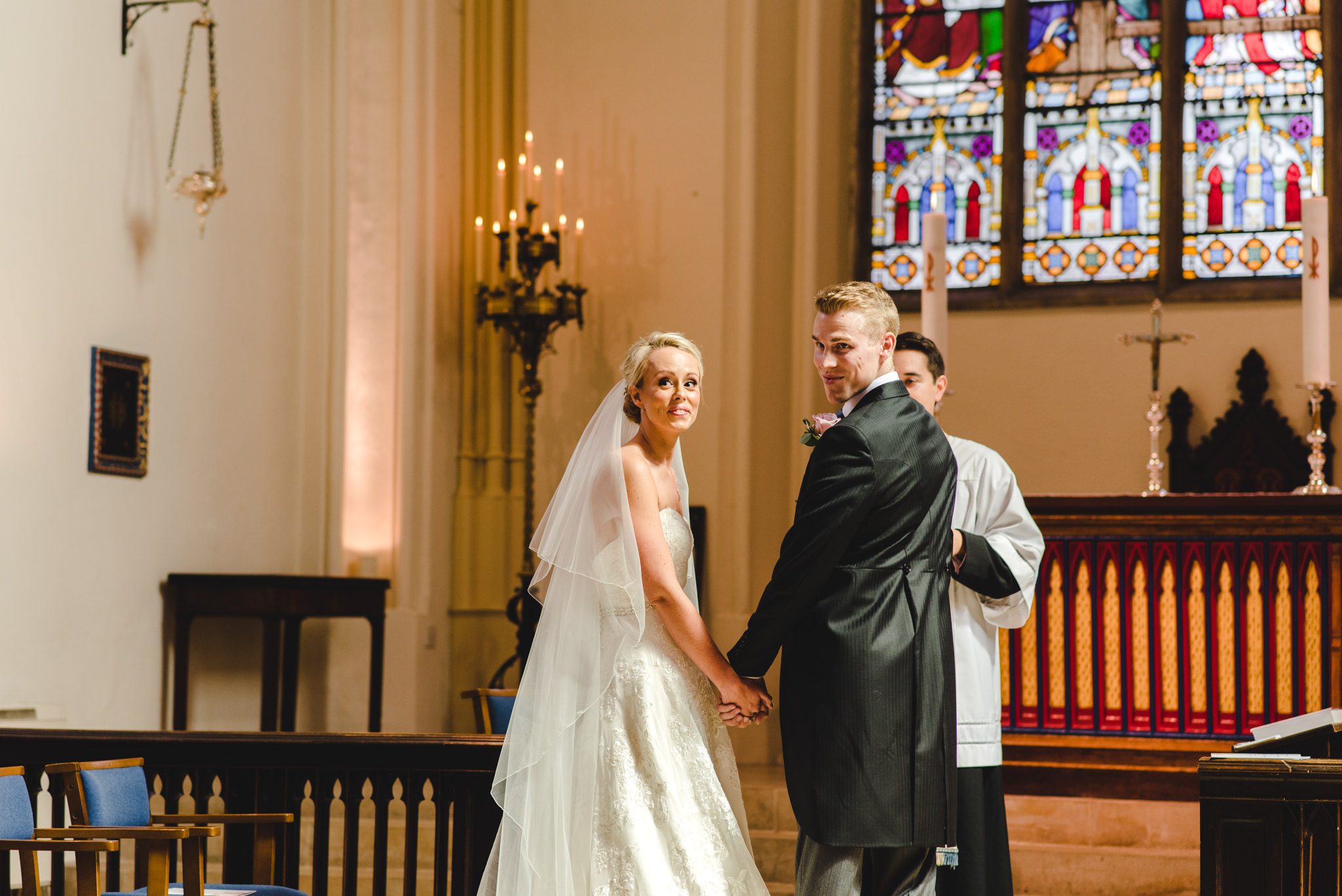 A couple checking there are no objections at their wedding!