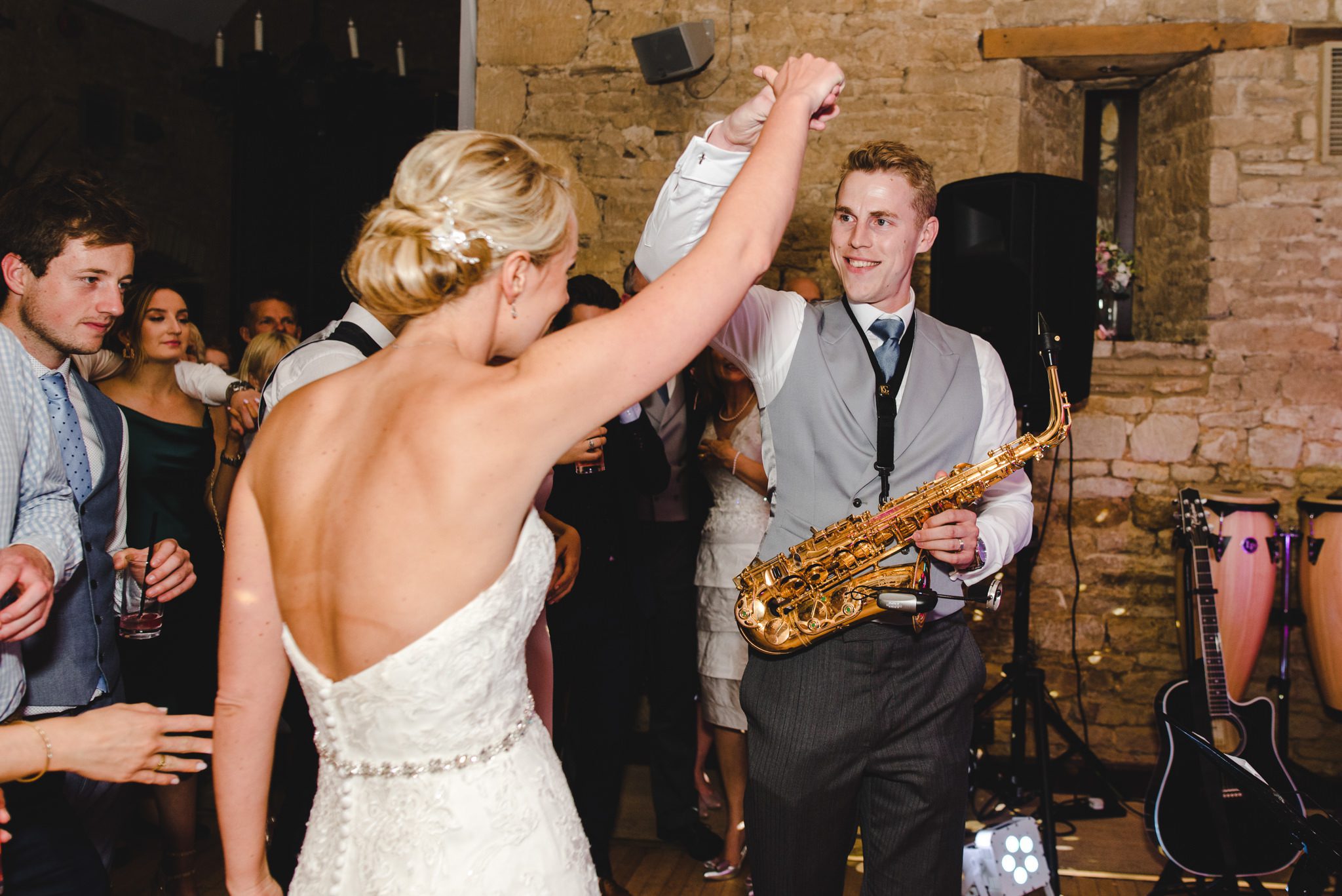 A bride and groom having a dance