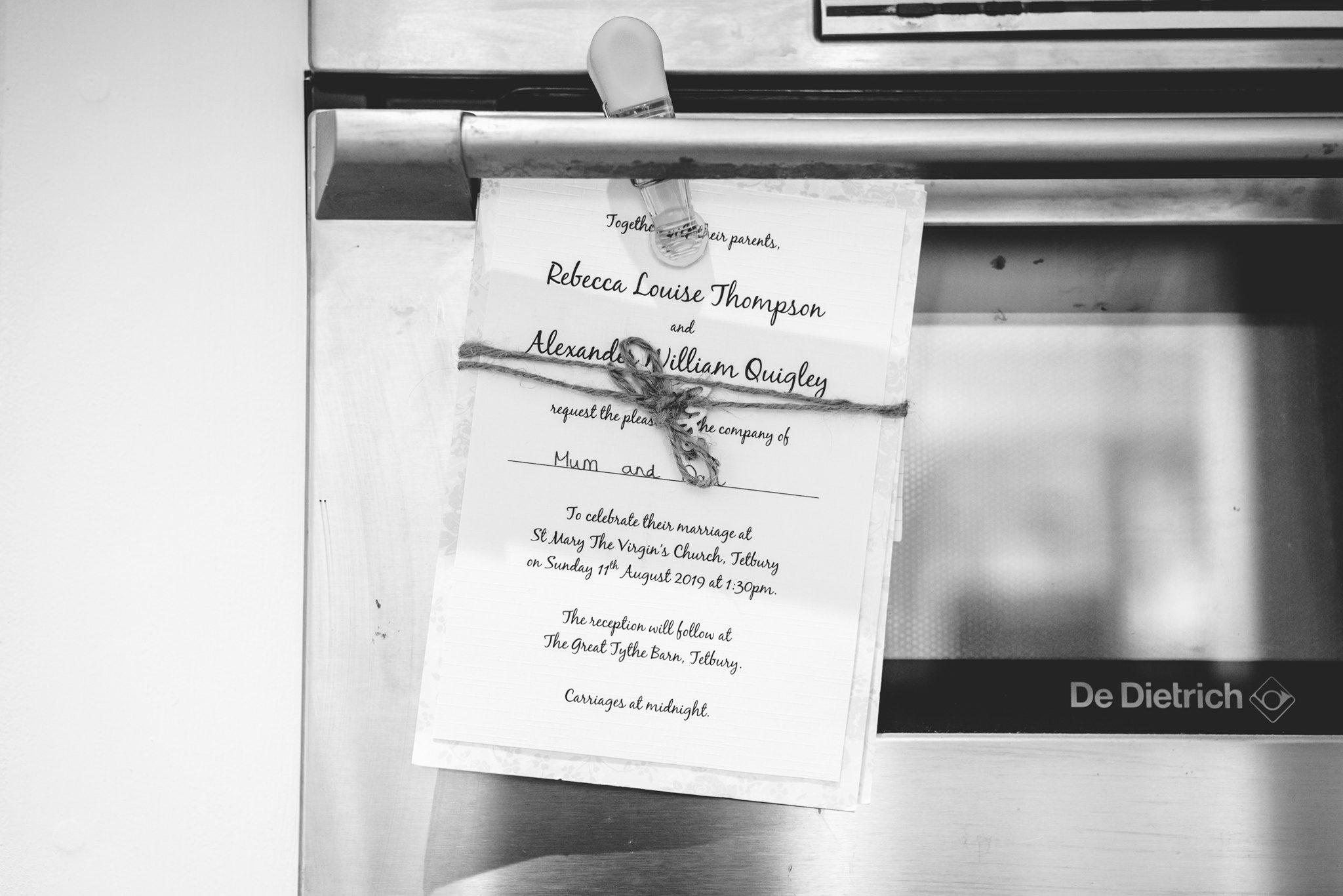 Wedding invitation stuck to a fridge