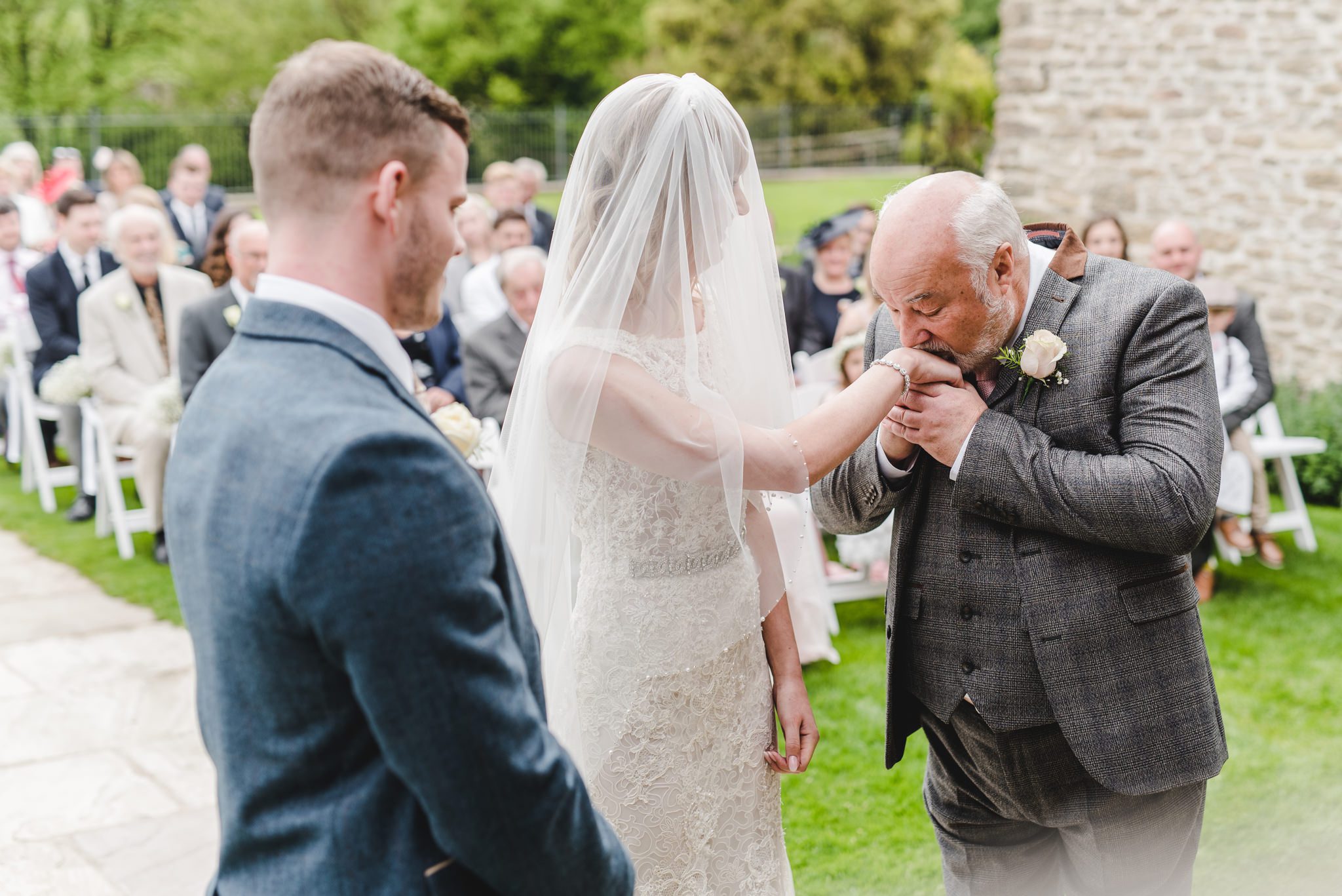 Father giving away his bride