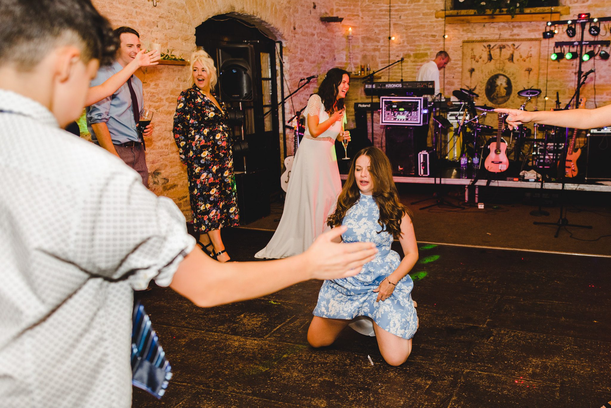 A wedding guest dancing in Gloucestershire