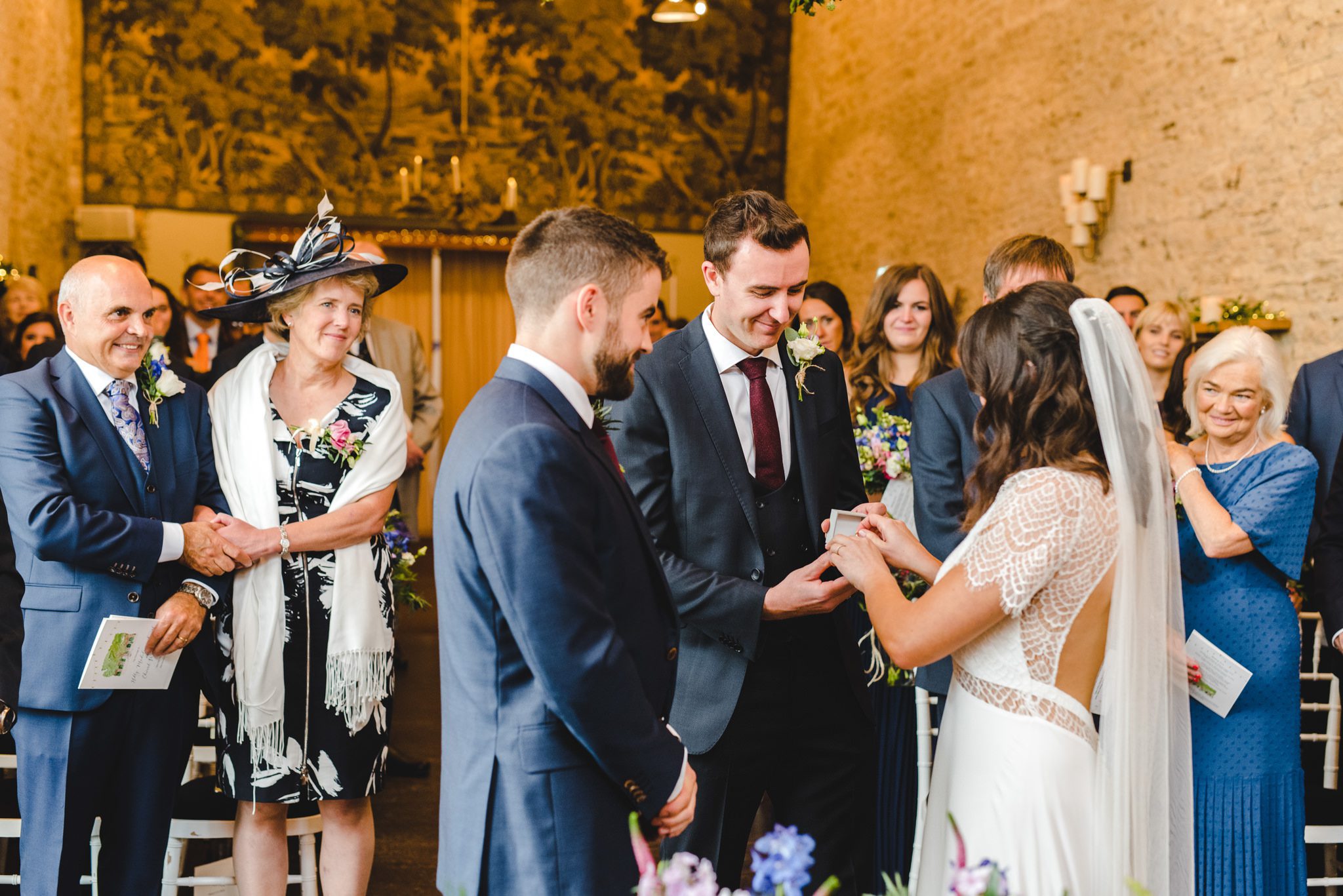 Wedding ceremony ring exchange at Merriscourt