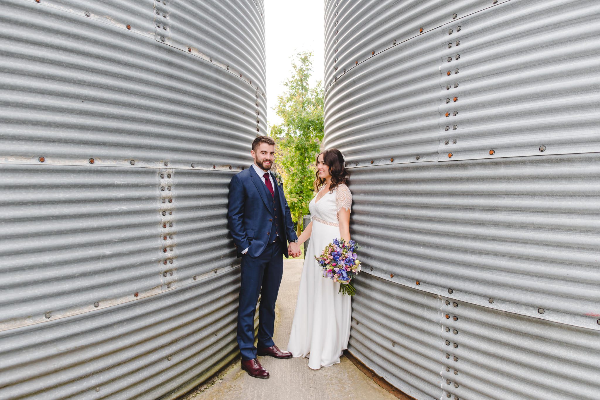 Bride and Groom at the silos at Merriscourt