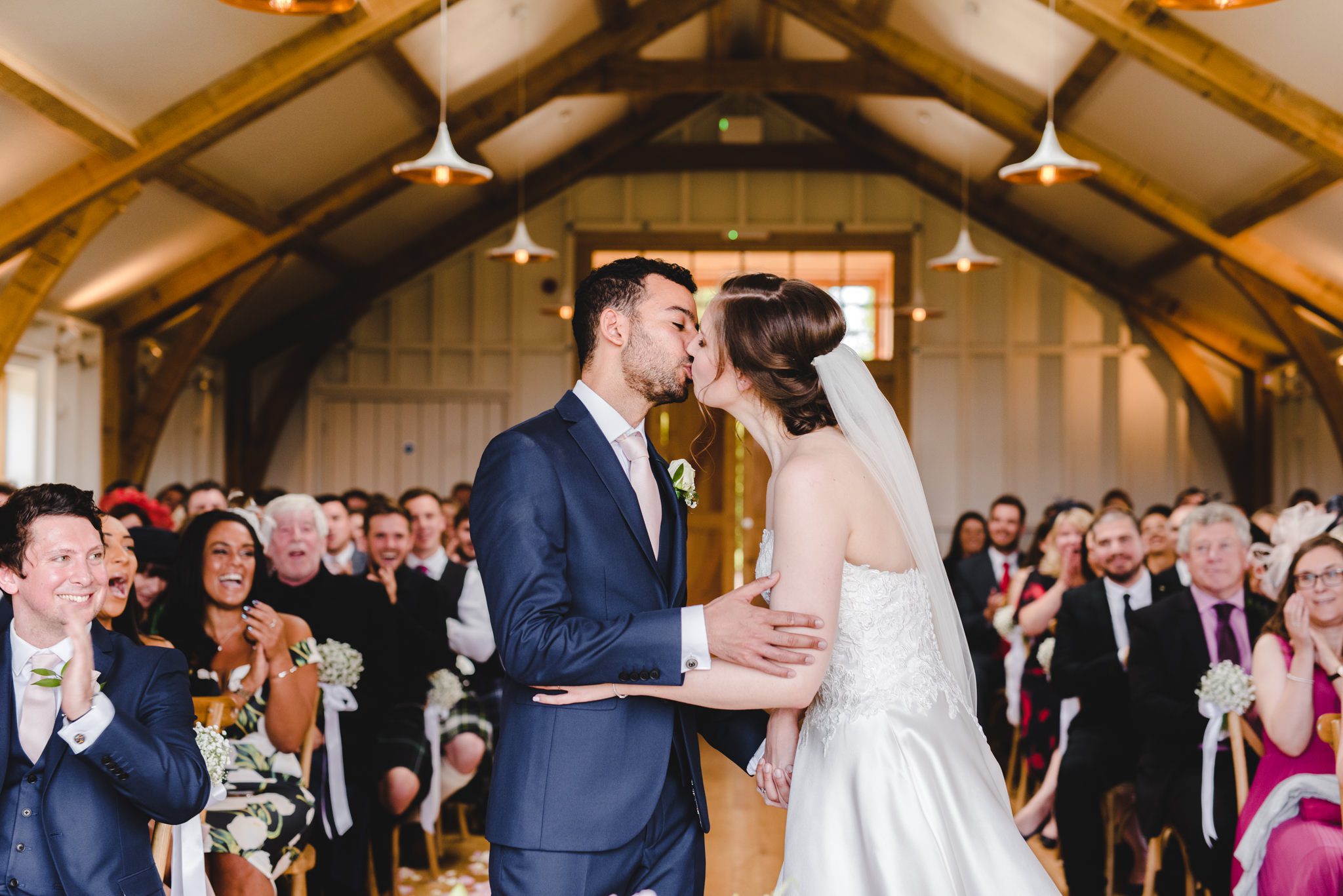 First kiss at a hyde house wedding in The Grange
