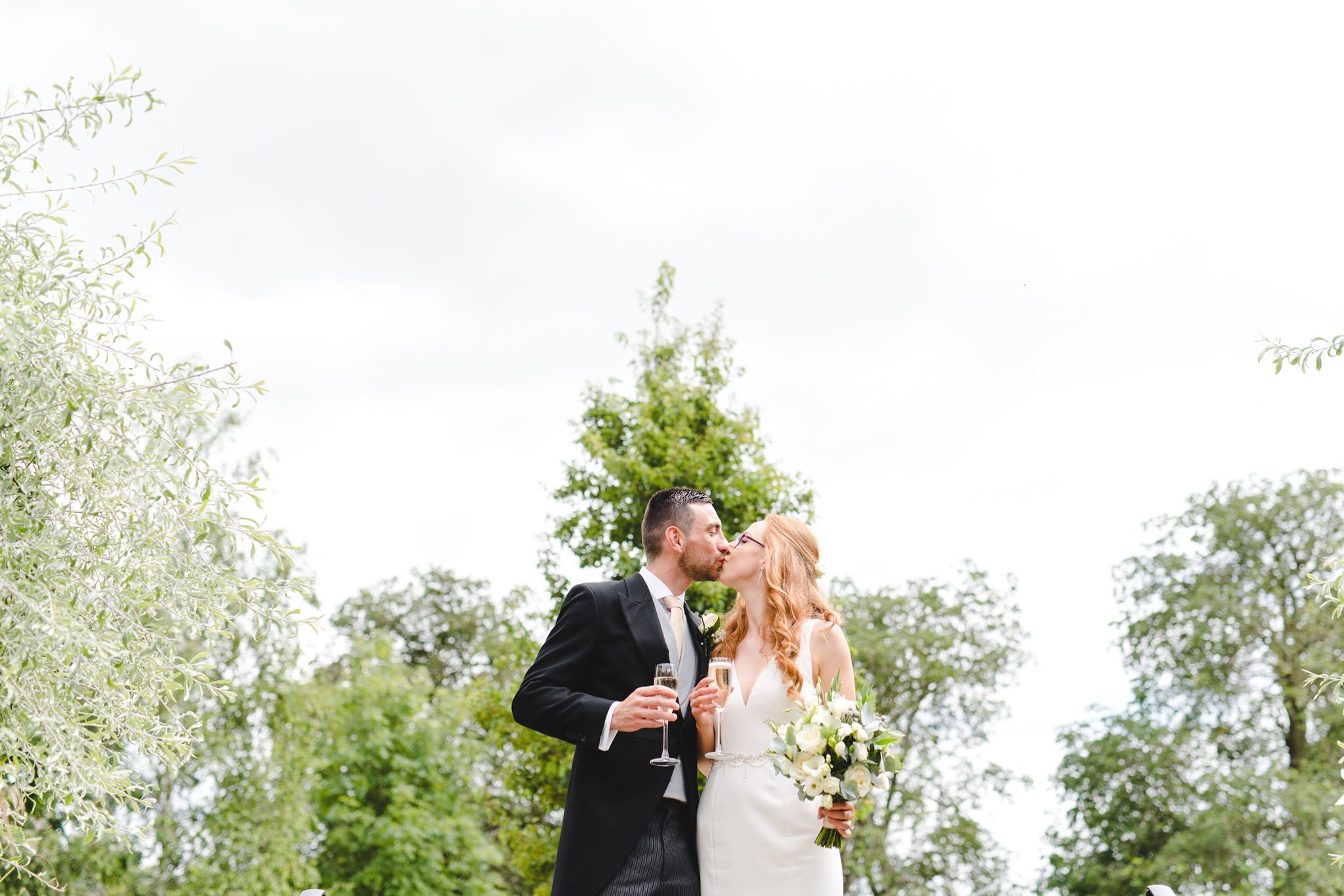 A just married bride and groom sharing a tender moment