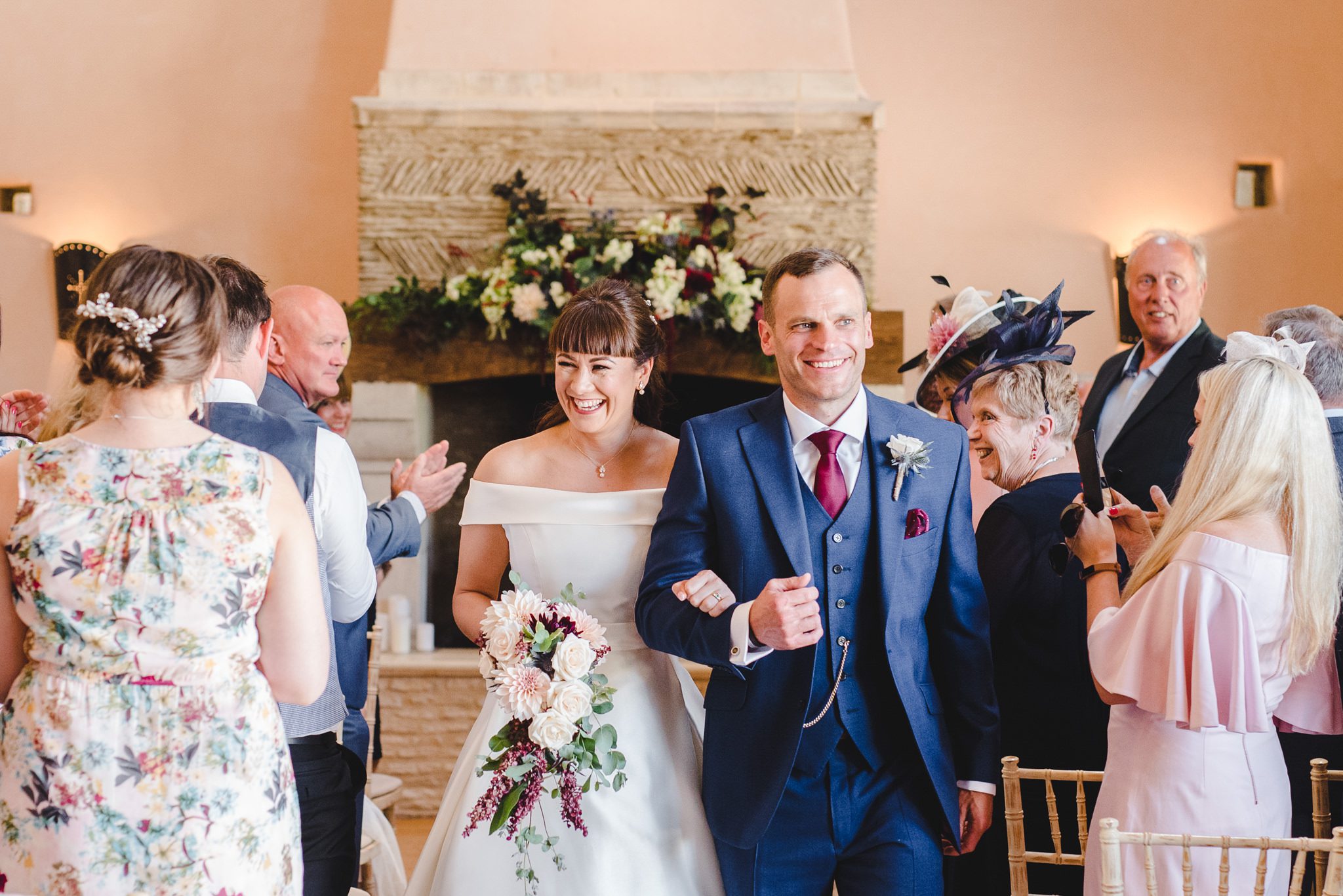 Bride and groom leaving their wedding ceremony