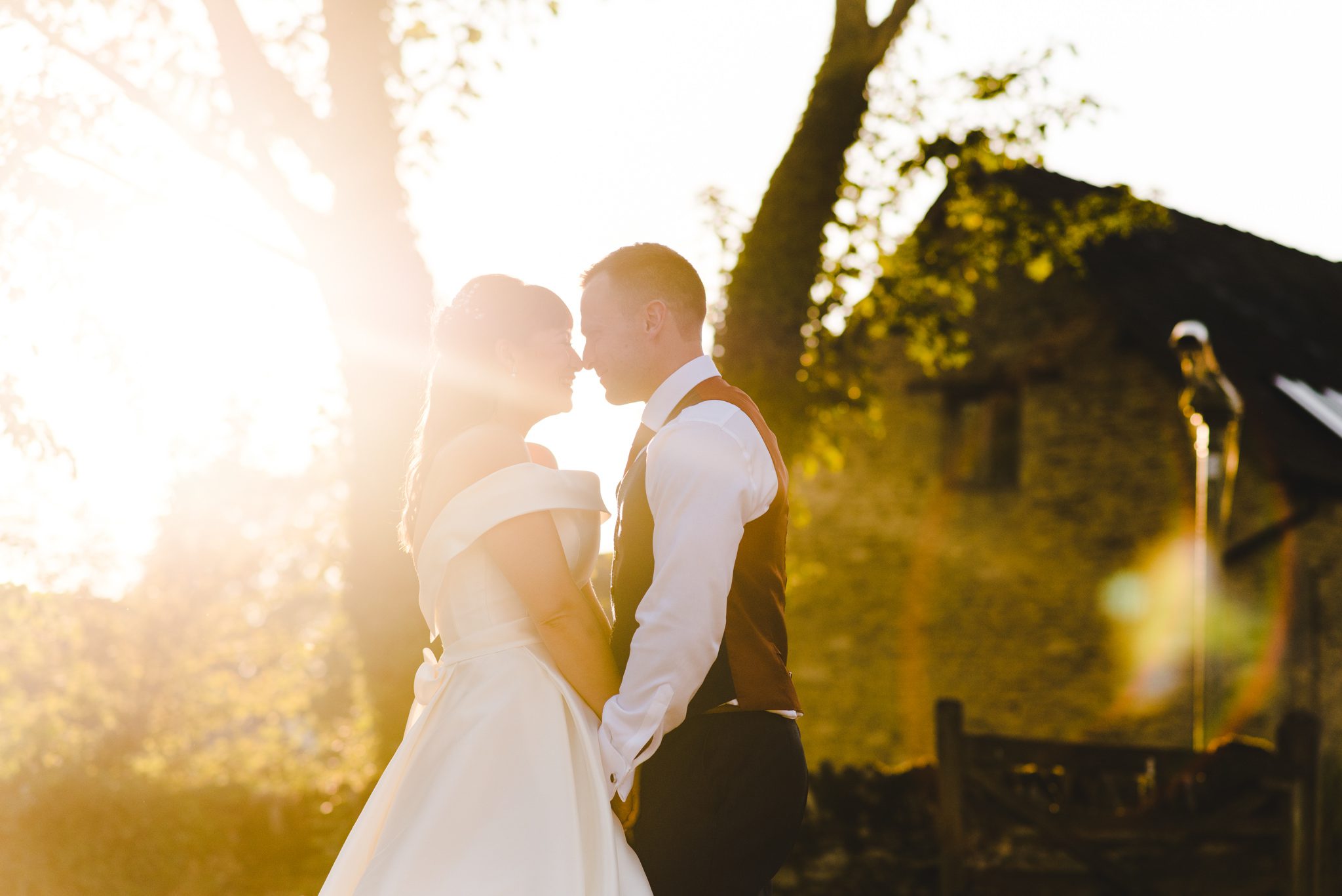 A bride and groom in Oxfordshire photographed at sunset