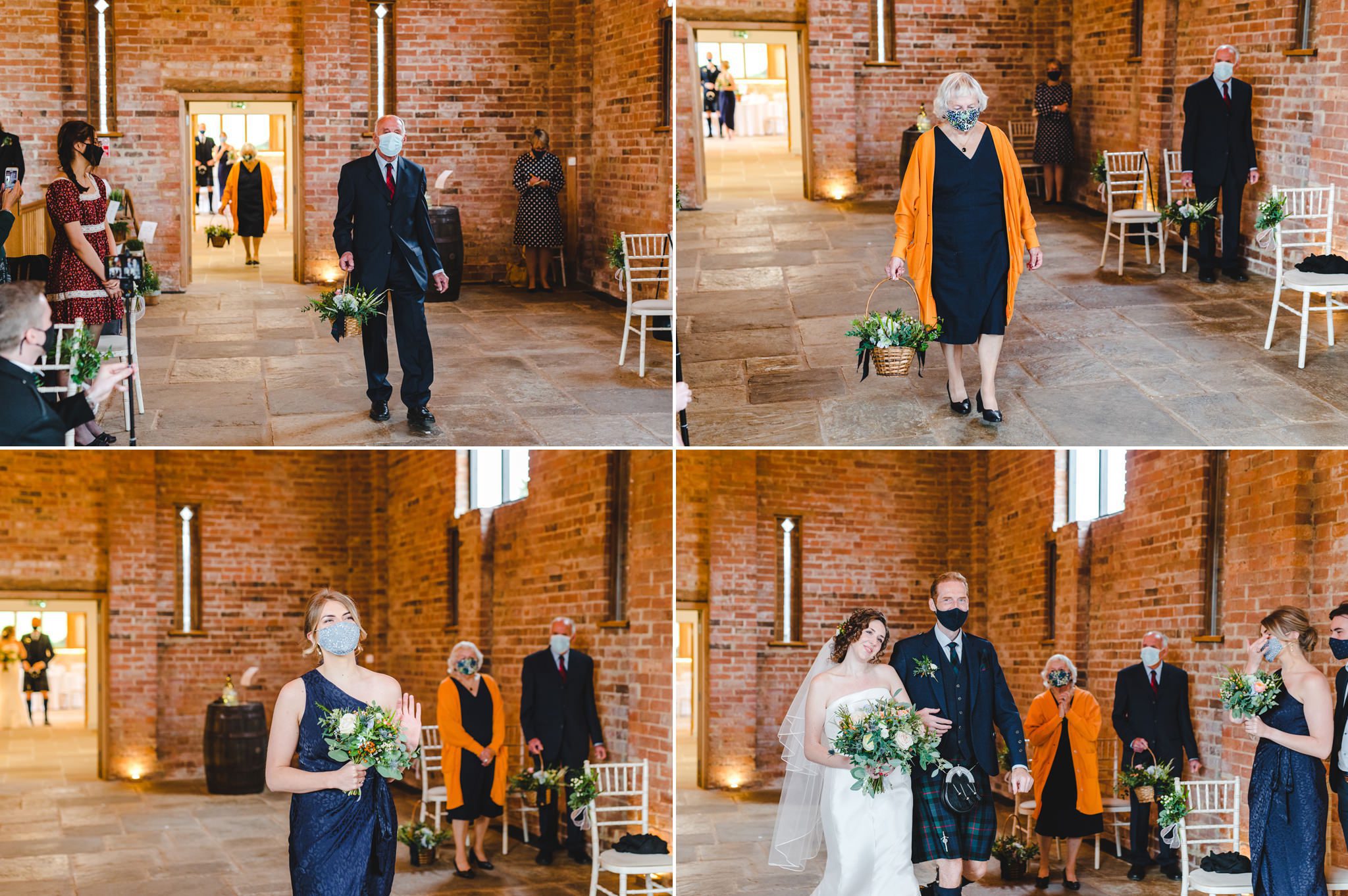 Bridesmaids and grandparents walking down the aisle in the barn at Mickleton Hills